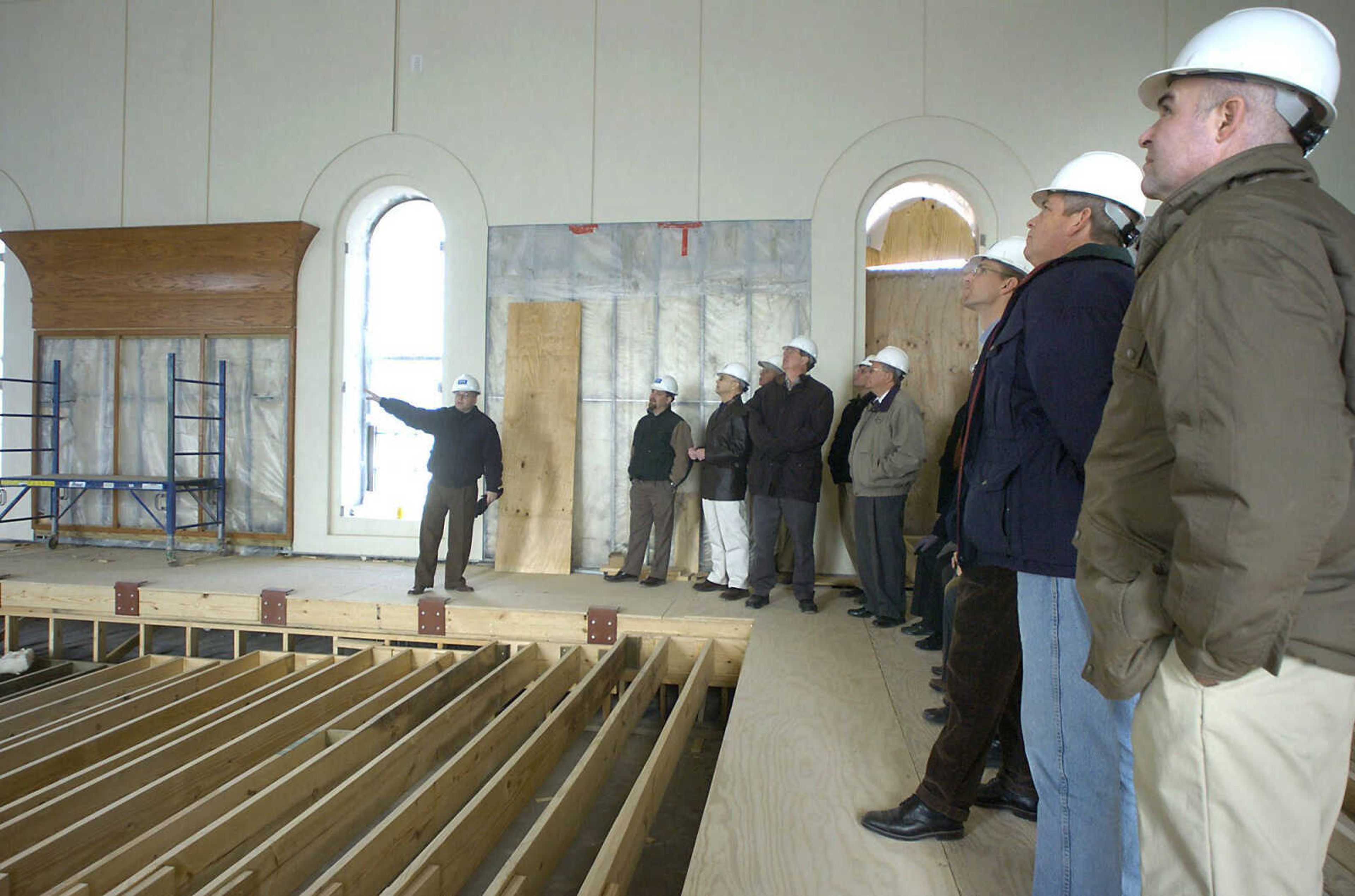 FRED LYNCH ~ flynch@semissourian.com
Cape Girardeau Noon Lions Club members toured the River Campus with assistant director Robert Cerchio, left, who discussed the renovation of the old chapel of St. Vincent's Seminary, on Jan. 31, 2007. The room will become a small performance hall.