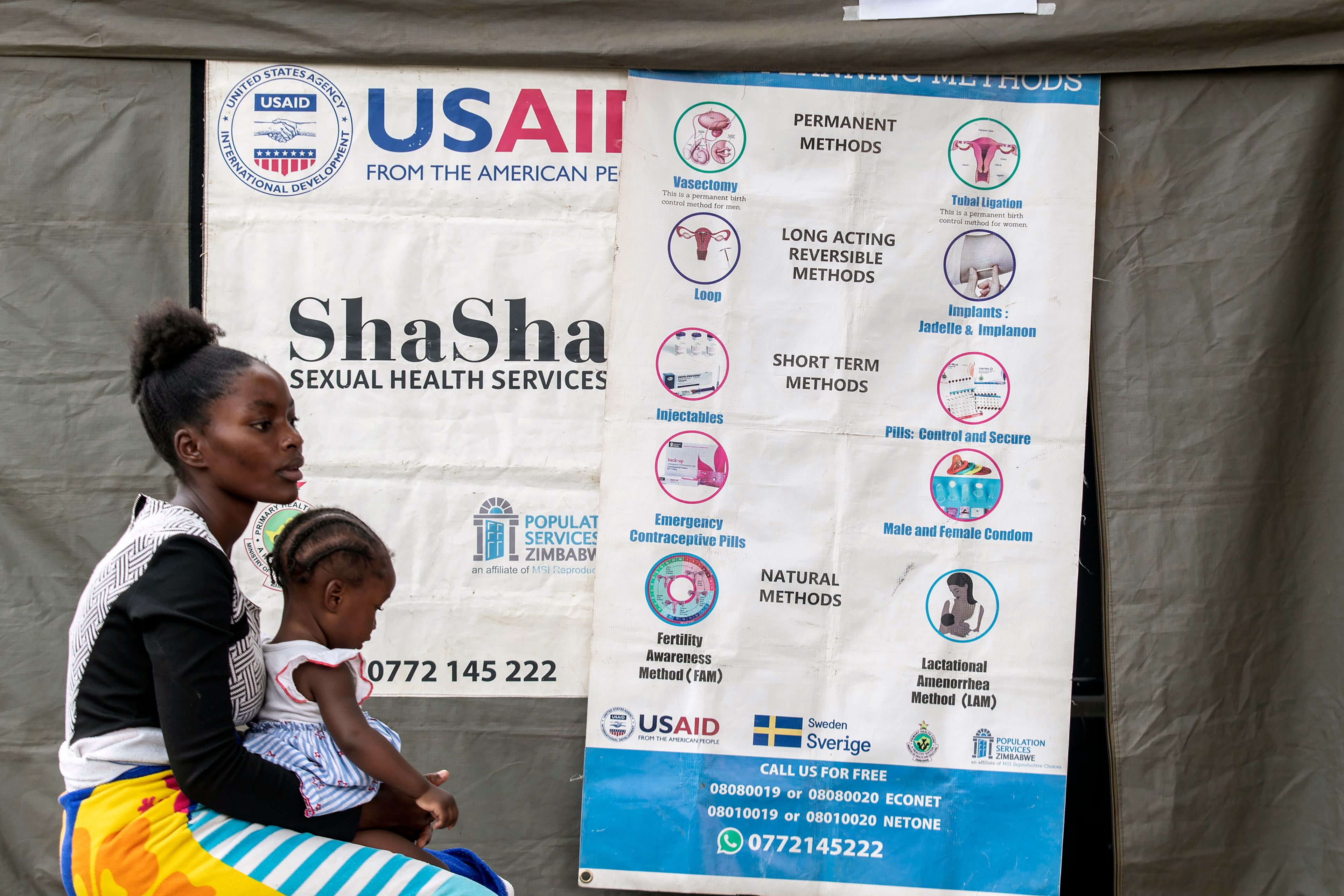 20 year old Chiedza Emmanuel waits to undergo a contraceptive implant procedure at an outtreach clinic in Epworth, Zimbabwe, Thursday, Nov. 14, 2024. (AP Photo/Aaron Ufumeli)