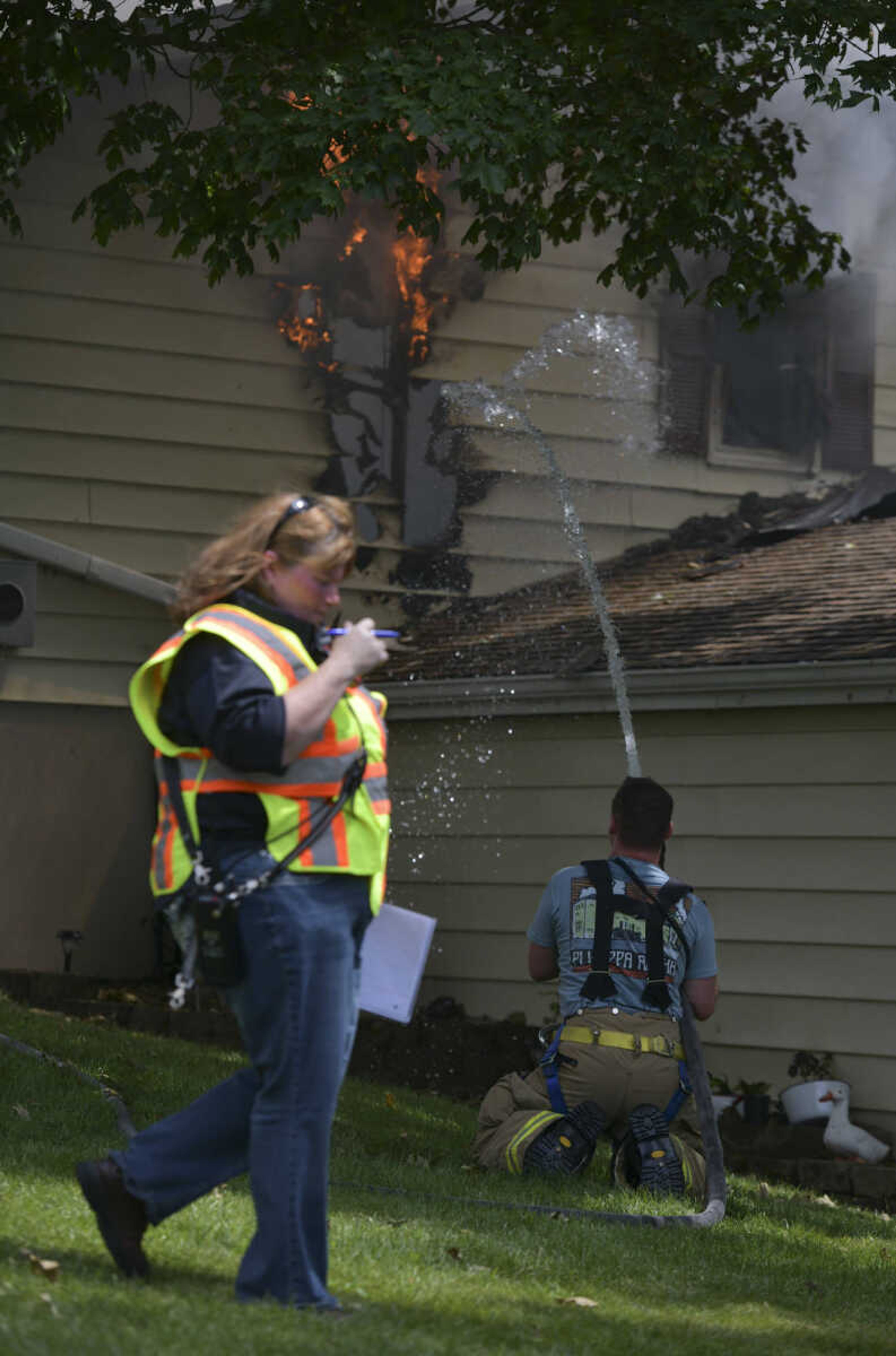 Members of the NBC Fire Protection District receive mutual aid from the Oran Fire Protection District, the Scott City Fire Department, the Scott County Rural Fire Protection District and the Scott County Sheriff's Office during a working fire Thursday, June 25, 2020, in the 300 block of Lake Road in Scott County between U.S. Highway 61 and Interstate 55.