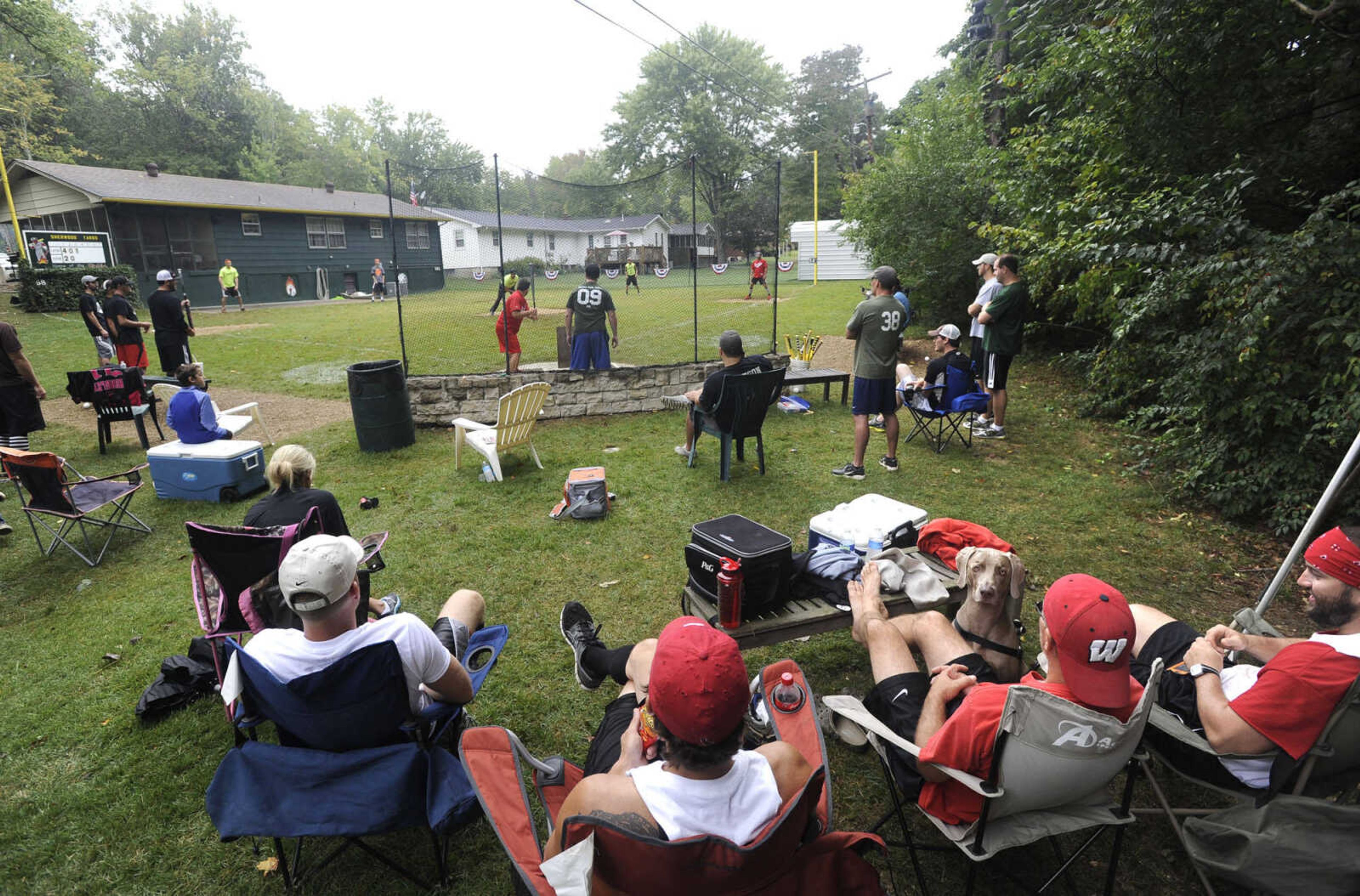 Wiffle Ball fans watch the Diablos play the Rusty Ducks at Sherwood Yards in Cape Girardeau.