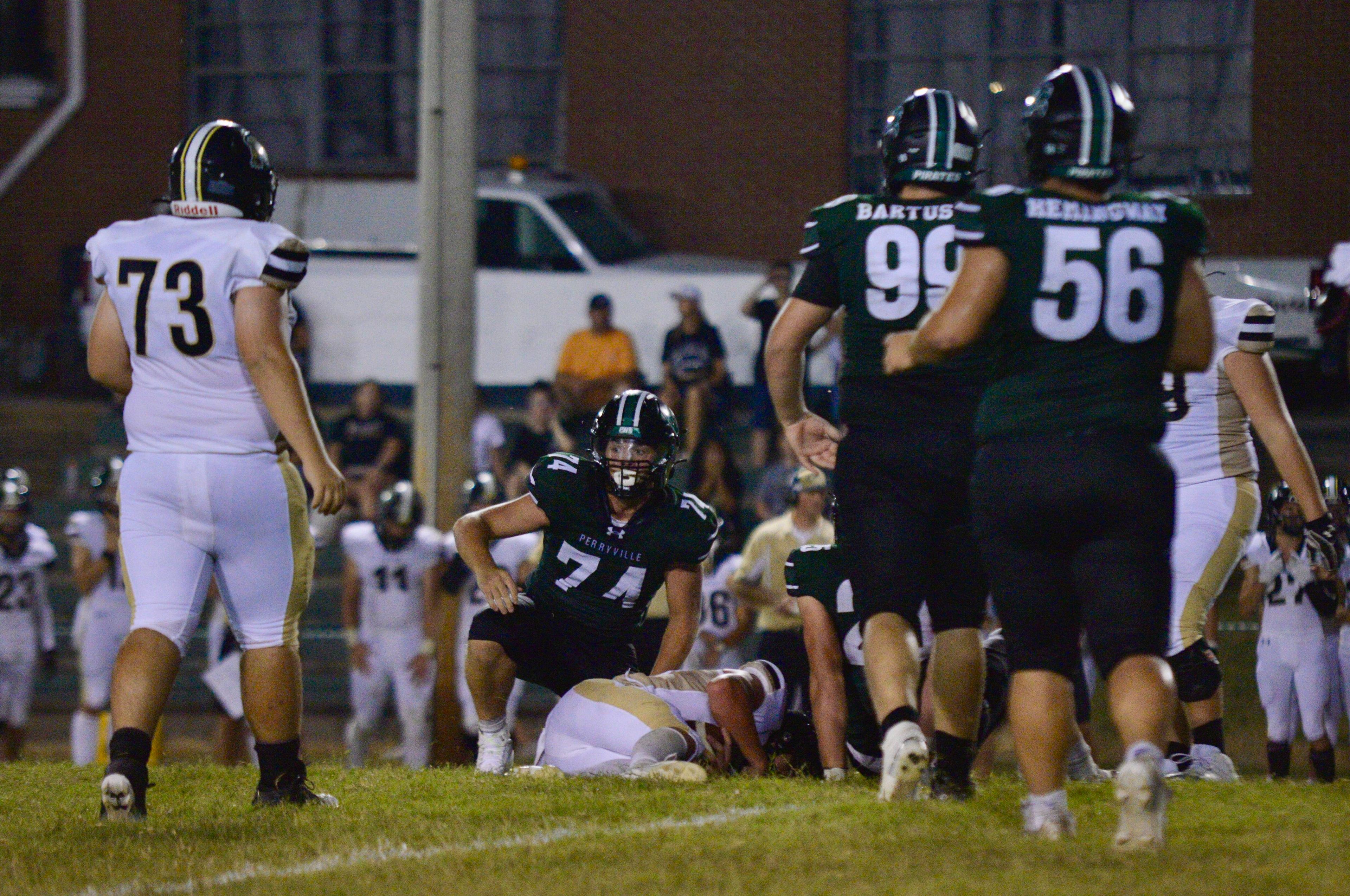 Perryville defensive end Alex Hayden sacks the Fredericktown quarterback on Thursday, Aug. 29, in Perryville, Mo. 