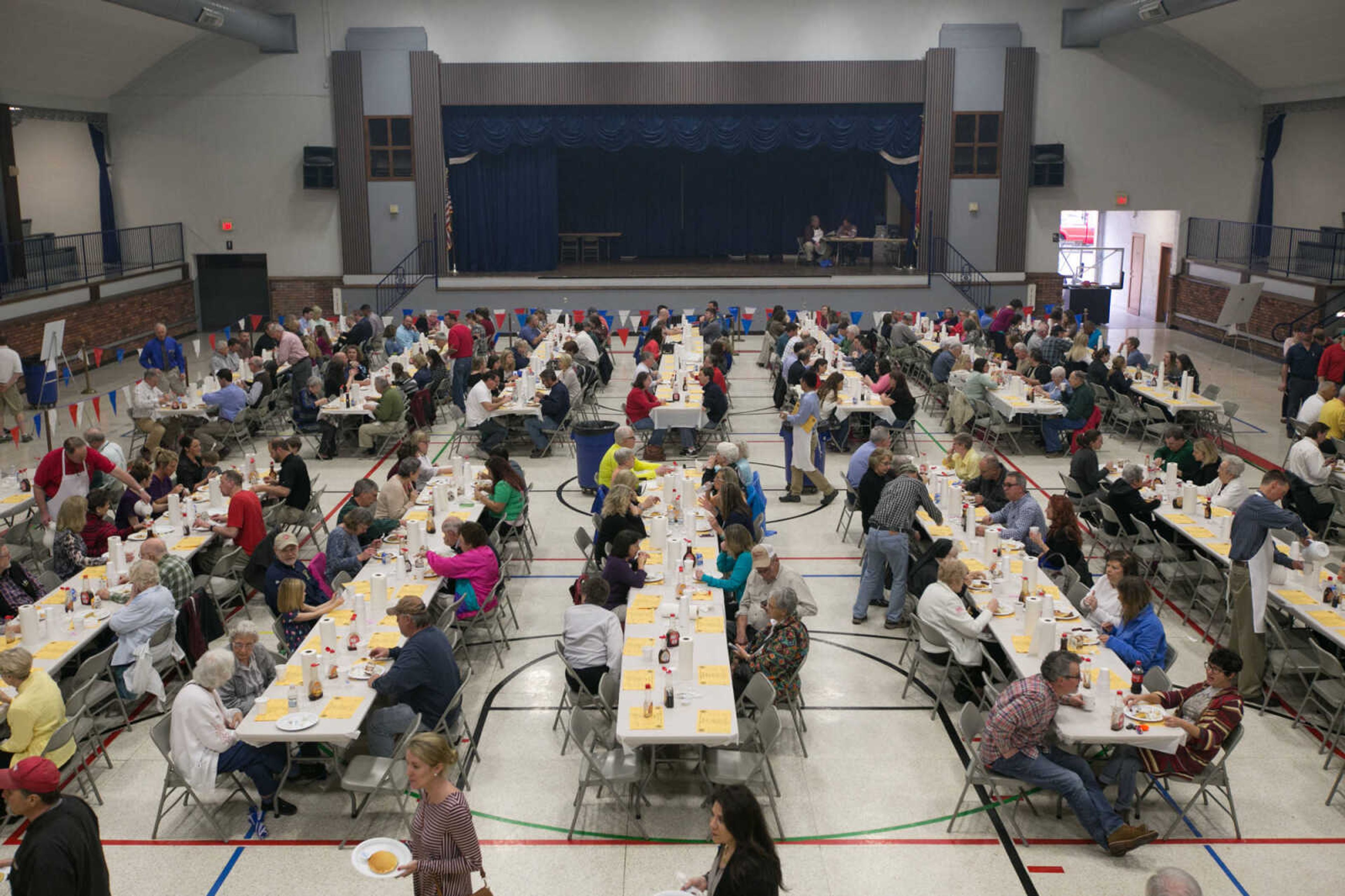 GLENN LANDBERG ~ glandberg@semissourian.com

Patrons dig into stacks of pancakes during the 78th annual Noon Lions Club Pancake Day Wednesday, March 9, 2016 at the Arena Building in Cape Girardeau.