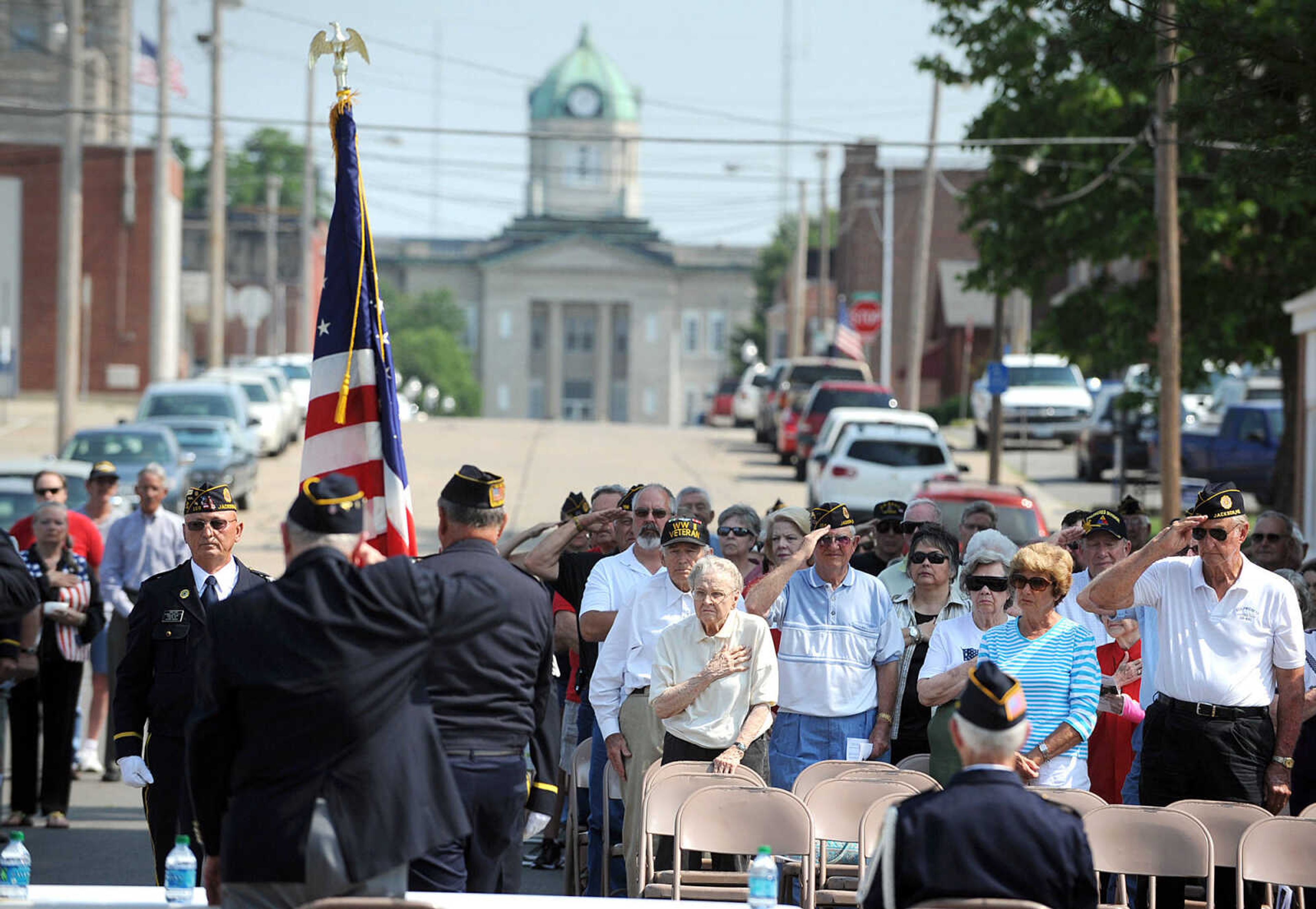 LAURA SIMON ~ lsimon@semissourian.com
The crowd pays tribute during the retiring of the colors Monday morning, May 28, 2012 at the Memorial Day service at Jackson City Cemetery.