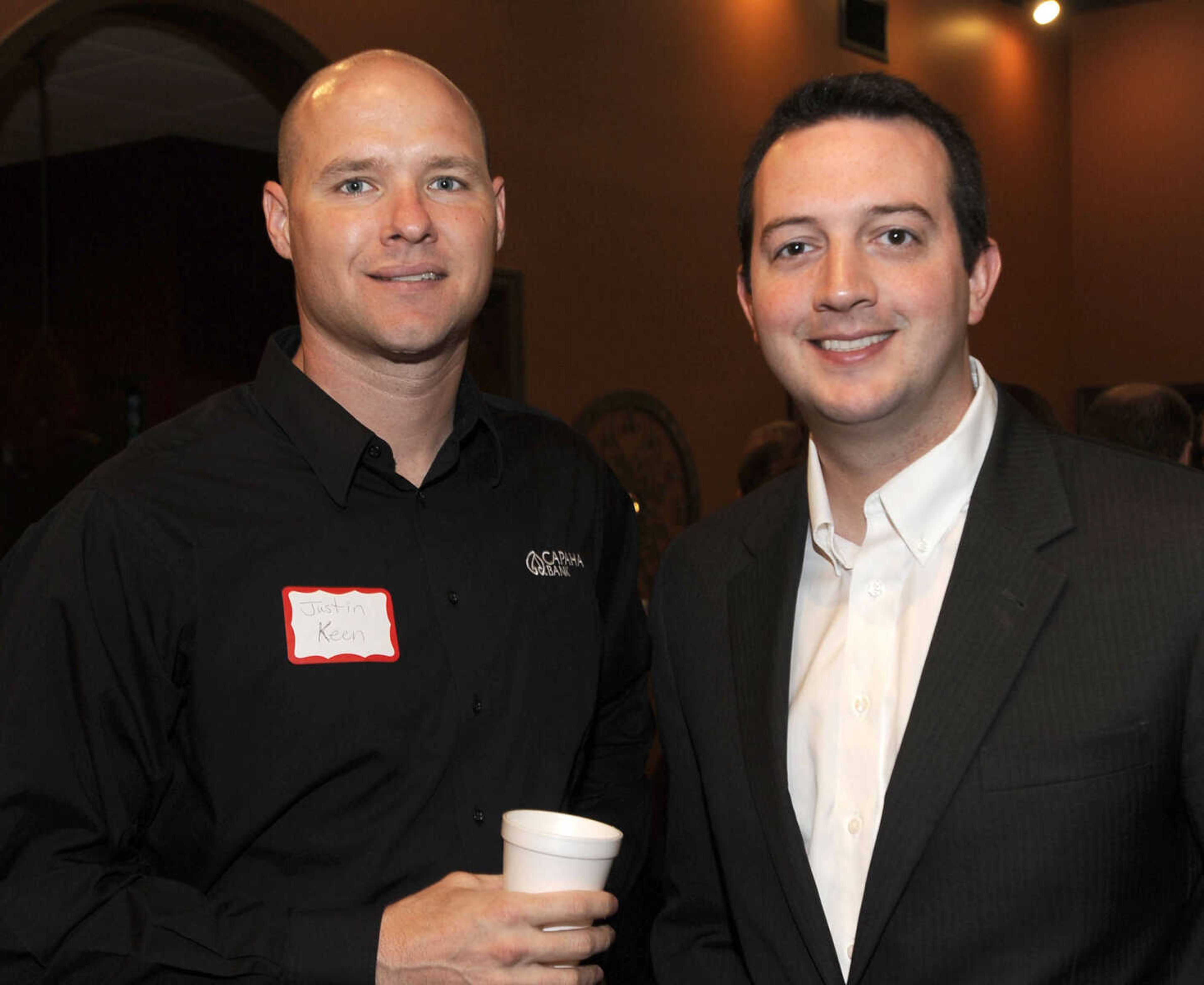 Justin Keen, left, with Capaha Bank, and Garrett Ozbun with Merrill Lynch.