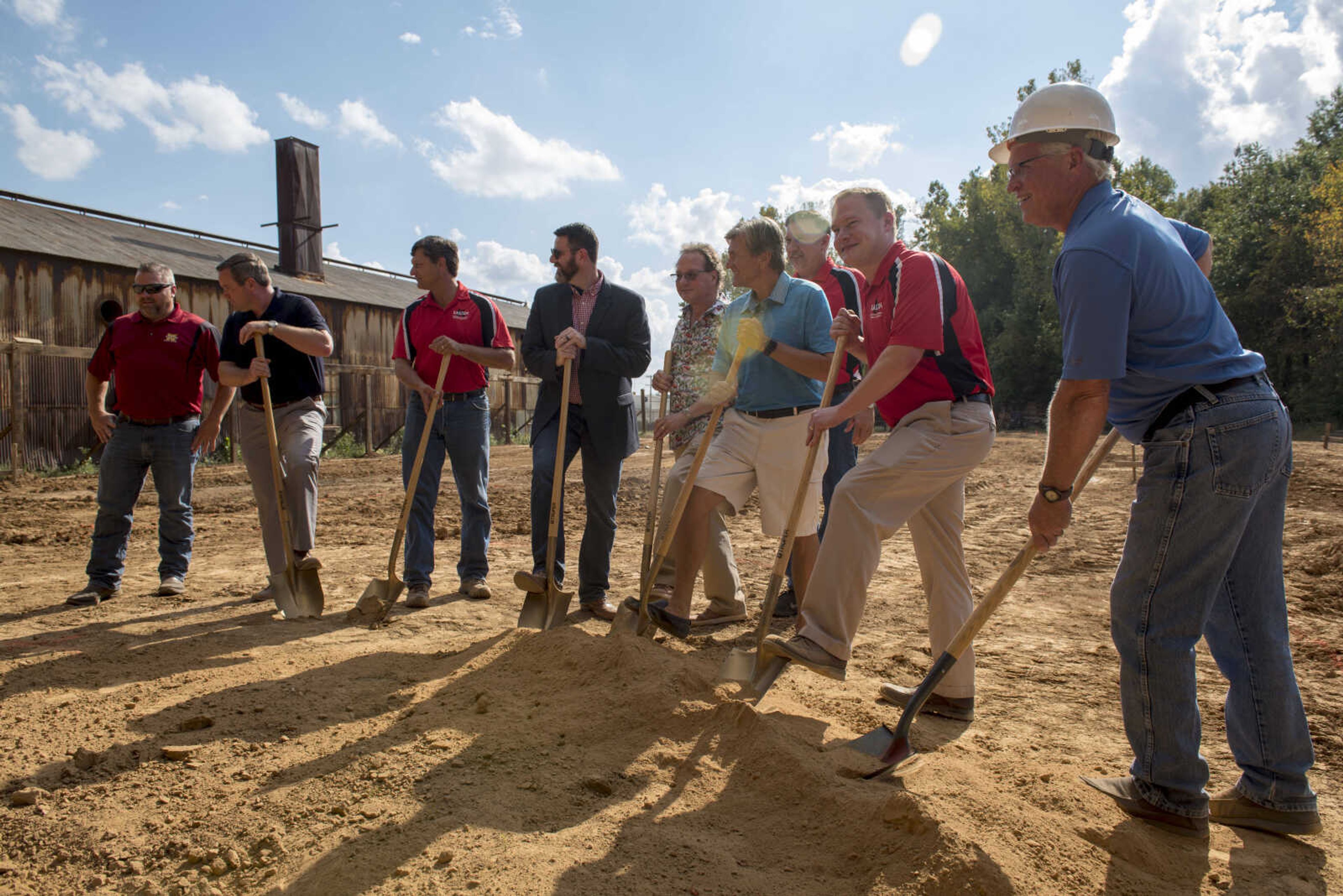 Kasten masonry supply CEO Craig Bohnsack, second from right, is joined by business leaders during a groundbreaking ceremony Friday, October 5, 2018.