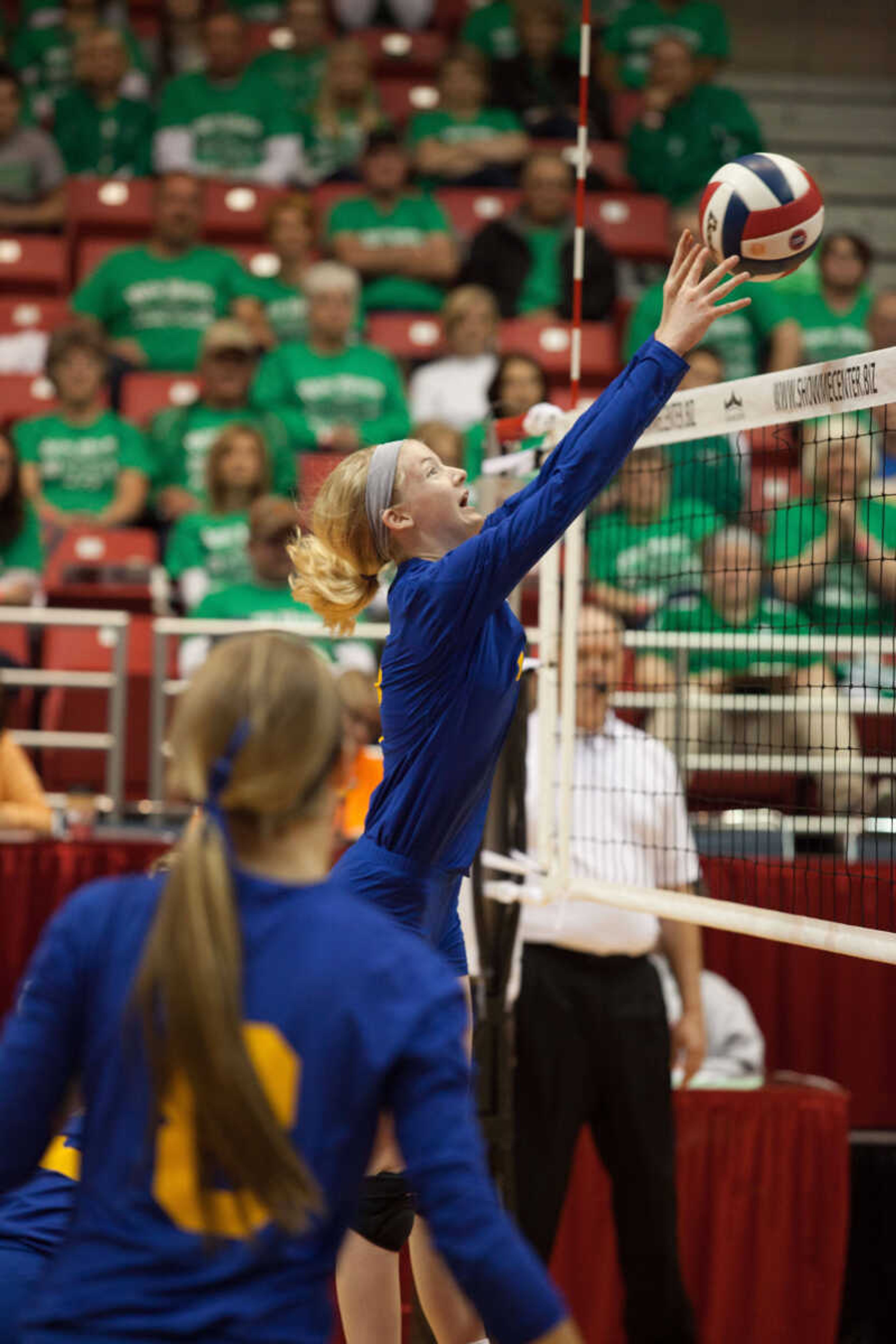 St. Vincent's Delia Lowman tips the ball during a set against New Haven in pool play of the Class 1 state championships Friday at the Show Me Center. The Indians won 25-18, 25-18. (John Paul Halford)