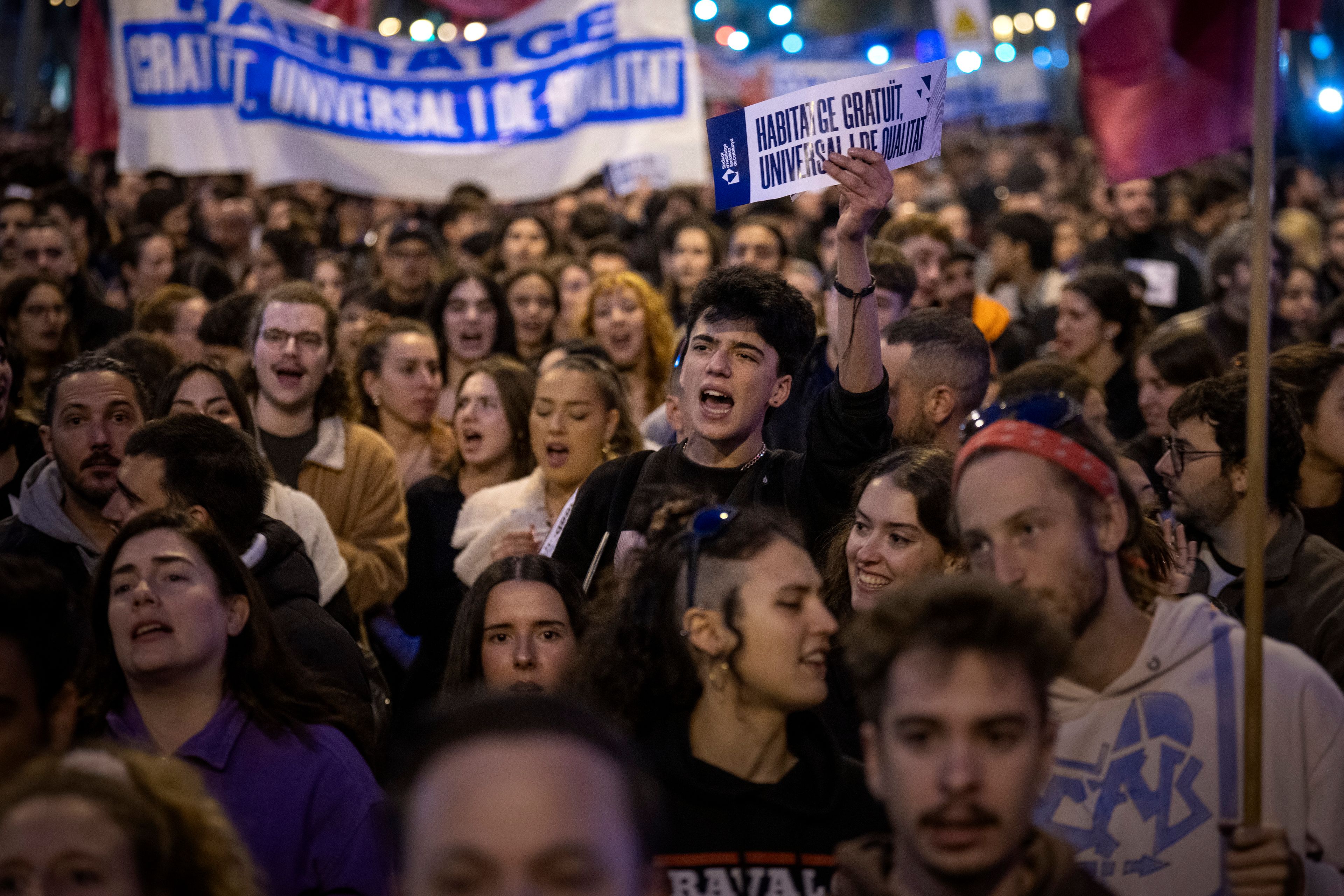 Demonstrators march to protest the skyrocketing cost of renting an apartment in Barcelona, Spain, Saturday, Nov. 23, 2024. (AP Photo/Emilio Morenatti)