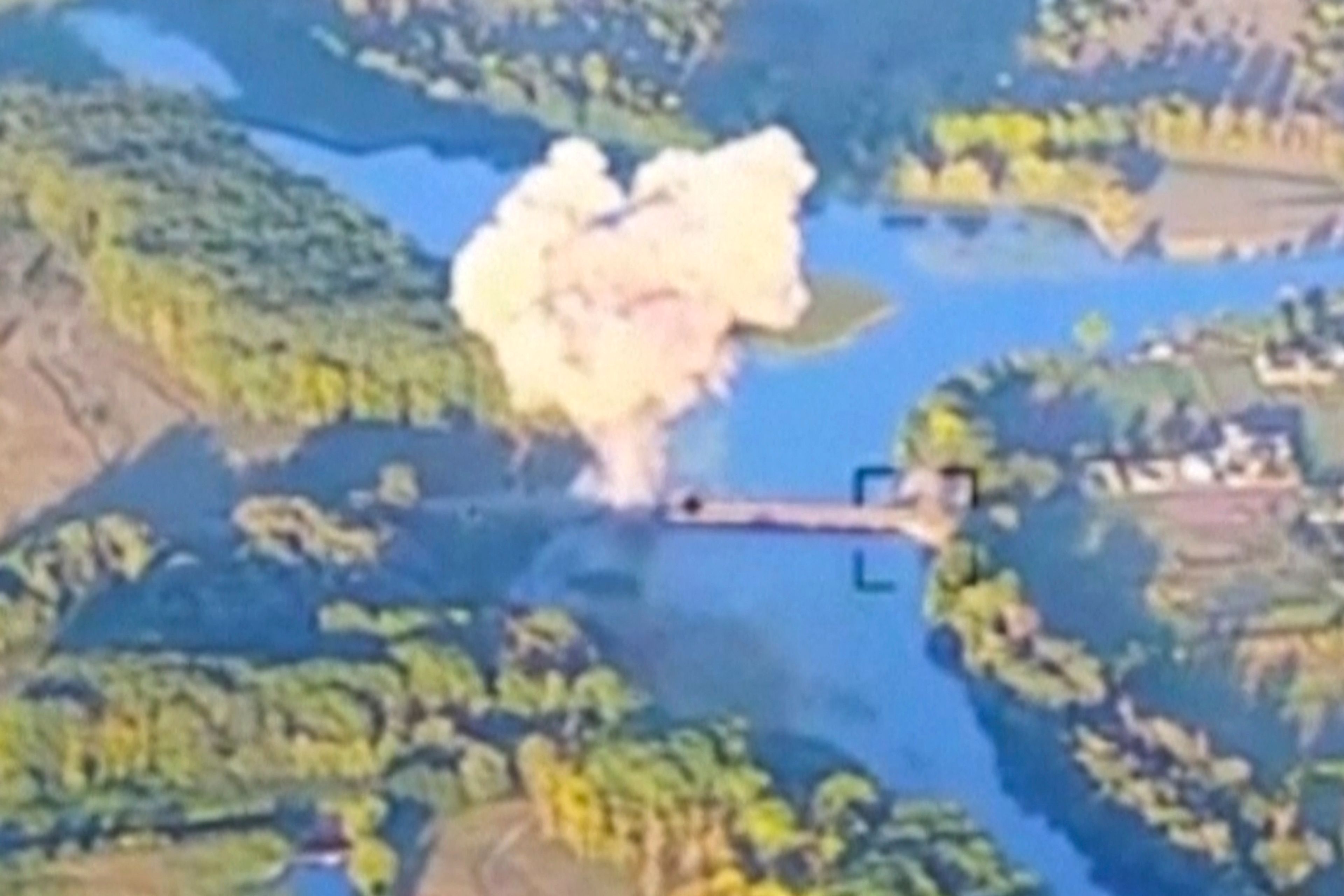 In this footage released by the Ukrainian armed forces Sunday, smoke billows in what is said to show the destruction of a key bridge in Russia's Kursk region. Ukraine has destroyed a key bridge in Russia's Kursk region and struck a second one nearby, less than two weeks into its stunning cross-border incursion, disrupting Russian supply routes and possibly signaling that its troops are planning to dig in.