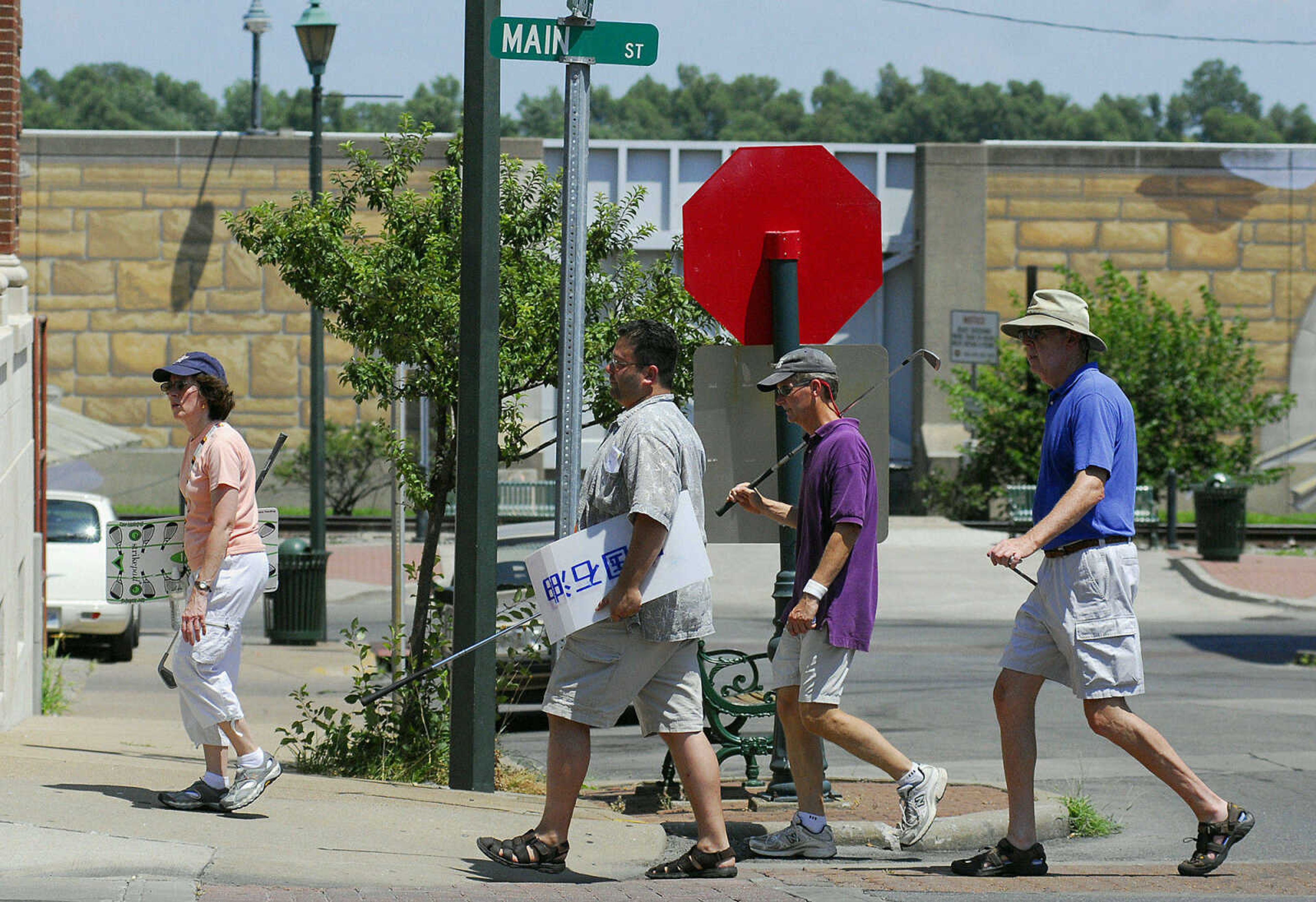 LAURA SIMON~lsimon@semissourian.com
BirdieBall golfers head to their next hole Sunday, June 27, 2010 during the First-Ever Fifth Annual Louis J. Lorimier World Famous Downtown Golf Tournament in Cape Girardeau. Golfers froom left, Marilyn Nenninger, Charles DiStefano,Brian Alworth, and Paul Nenninger.