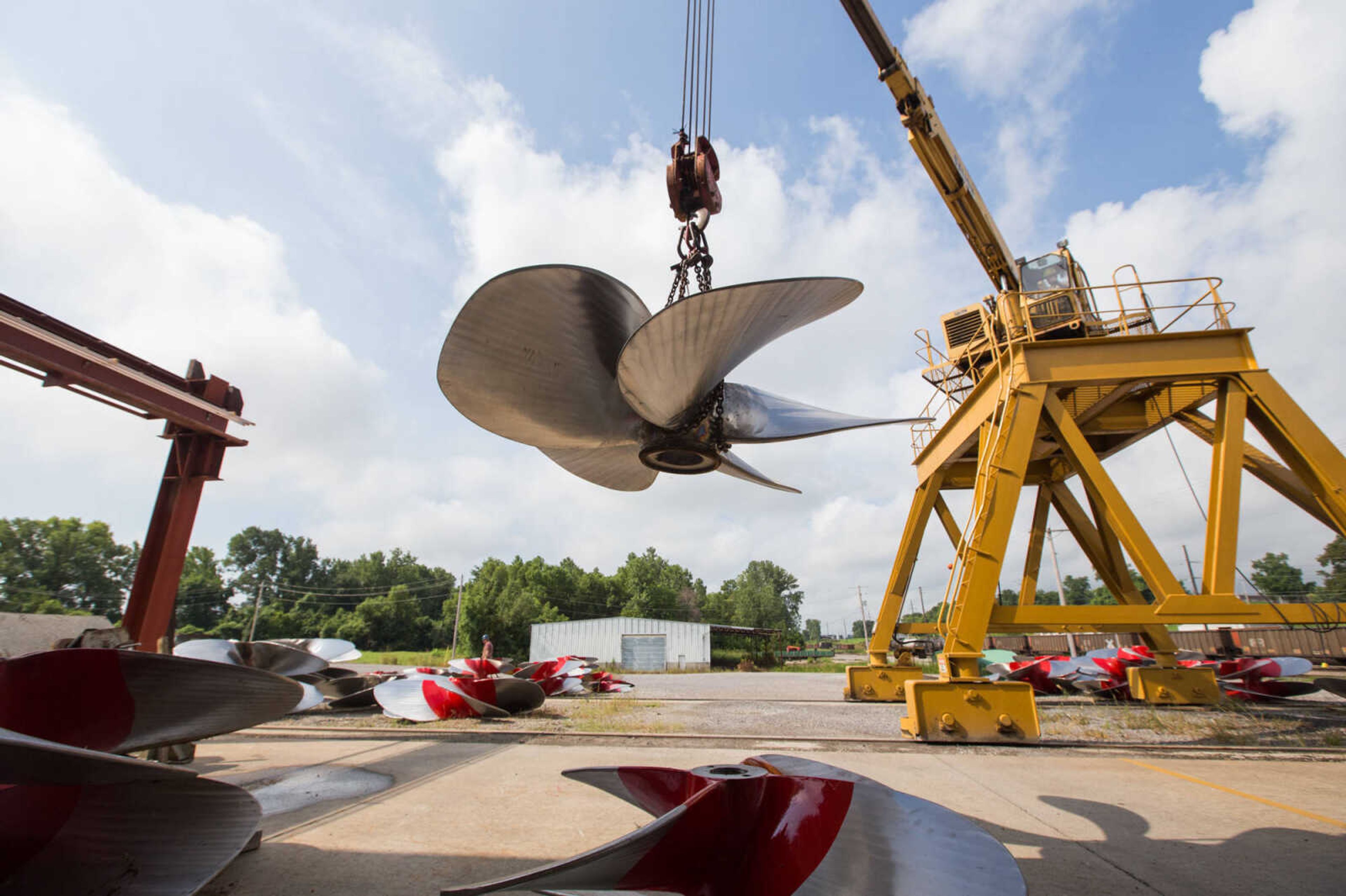 GLENN LANDBERG ~ glandberg@semissourian.com

Logan Farrenburg operates a crane to move propellers outside the repair shop at Missouri Dry Dock and Repair Co. in Cape Girardeau Wednesday, July 28, 2016.