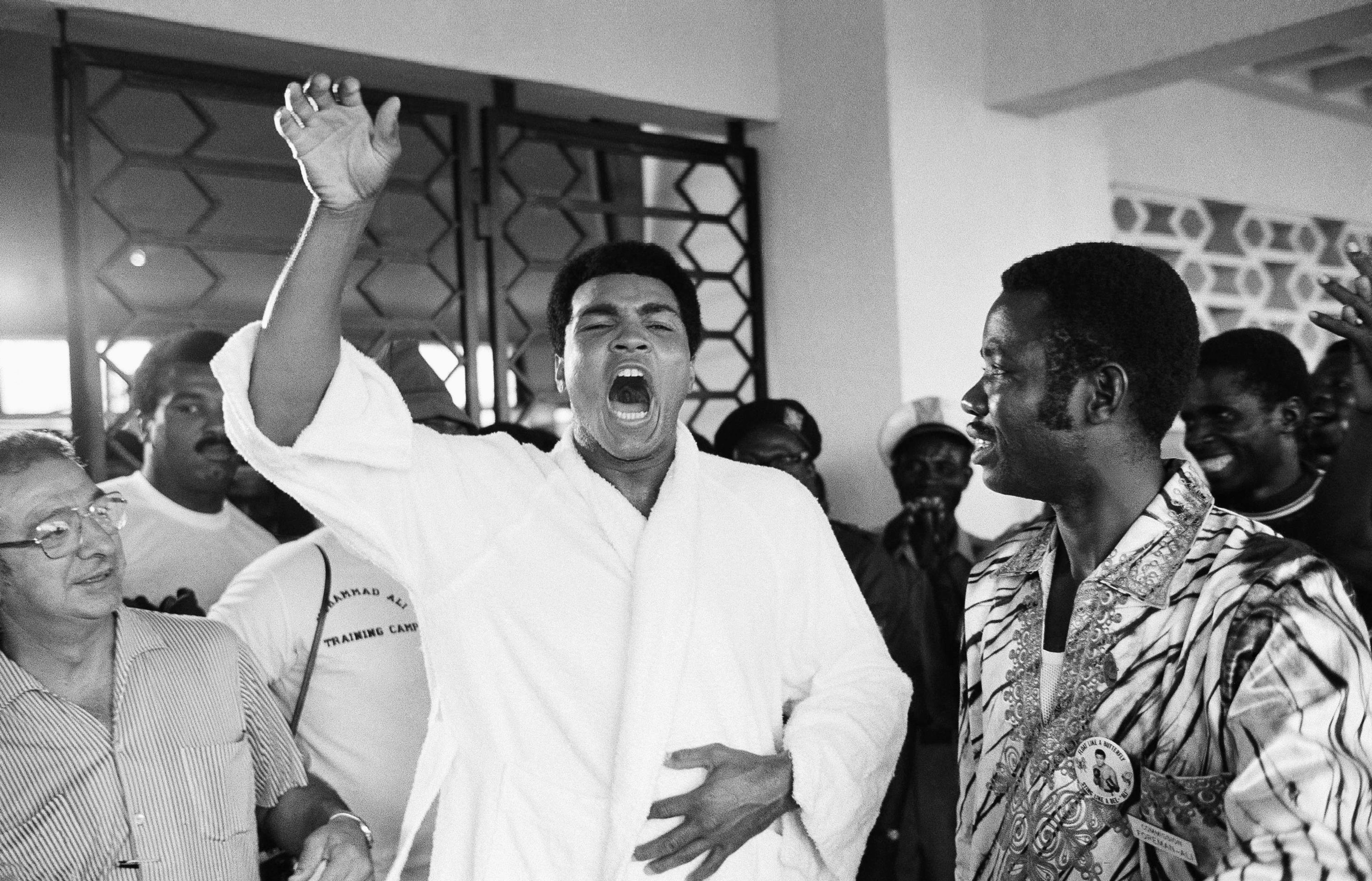 FILE - Muhammad Ali, due to fight George Foreman, world heavyweight champion in Kinshasa, Zaire, tells a crowd of boxing fans in N' Sele, Thursday, Sept. 12, 1974 "Ako bo mai ye," which translates from Zaire's Lingalla dialect as: "I will kill him." (AP Photo/Horst Faas, File)