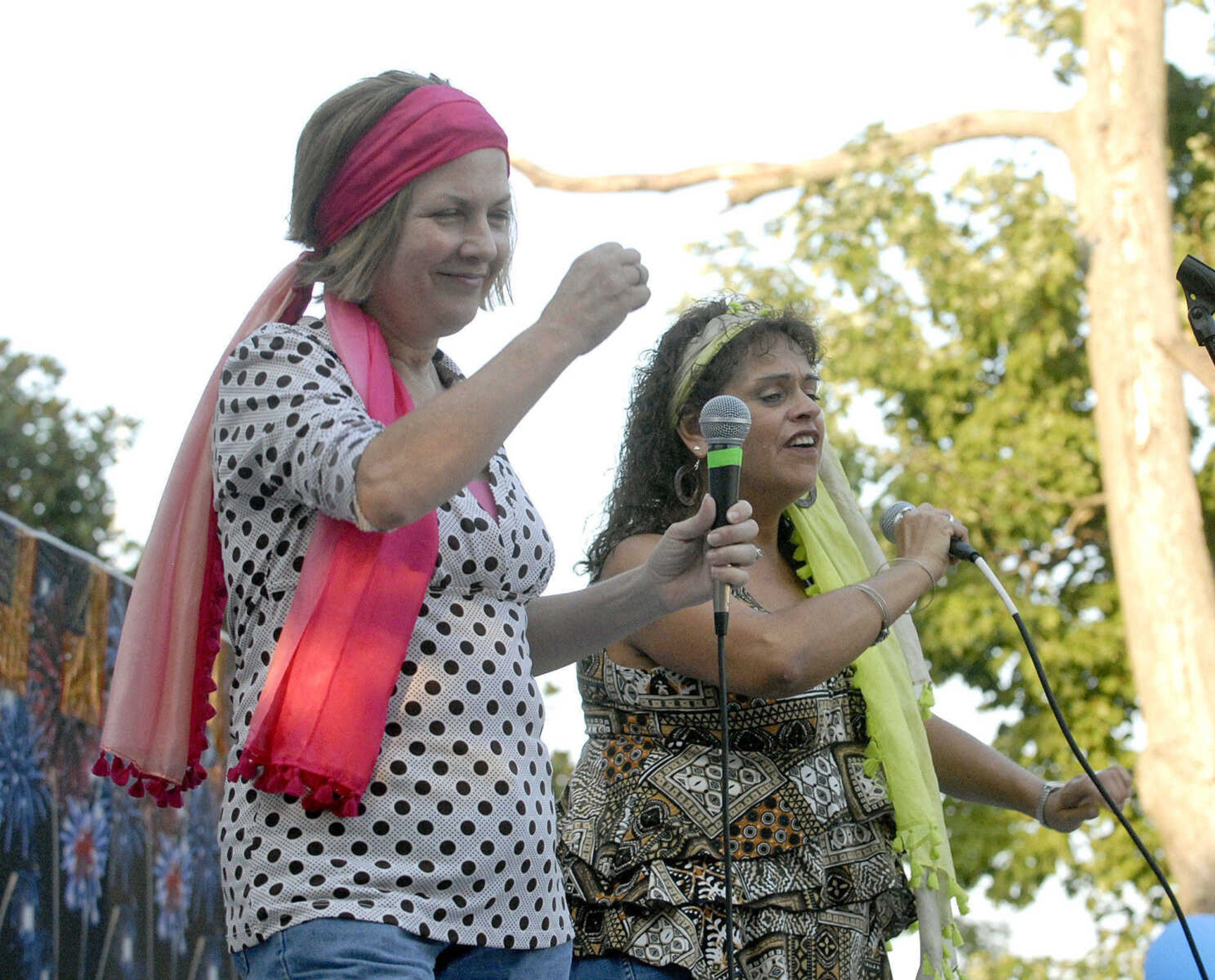 LAURA SIMON ~ lsimon@semissourian.com
Lorrie Litz, left, and Debbie Wade perform "These Boots are Made for Walkin'" in their rubber rain boots Wednesday, July 27, 2011 during the senior idol competition at Jackson Homecomers.