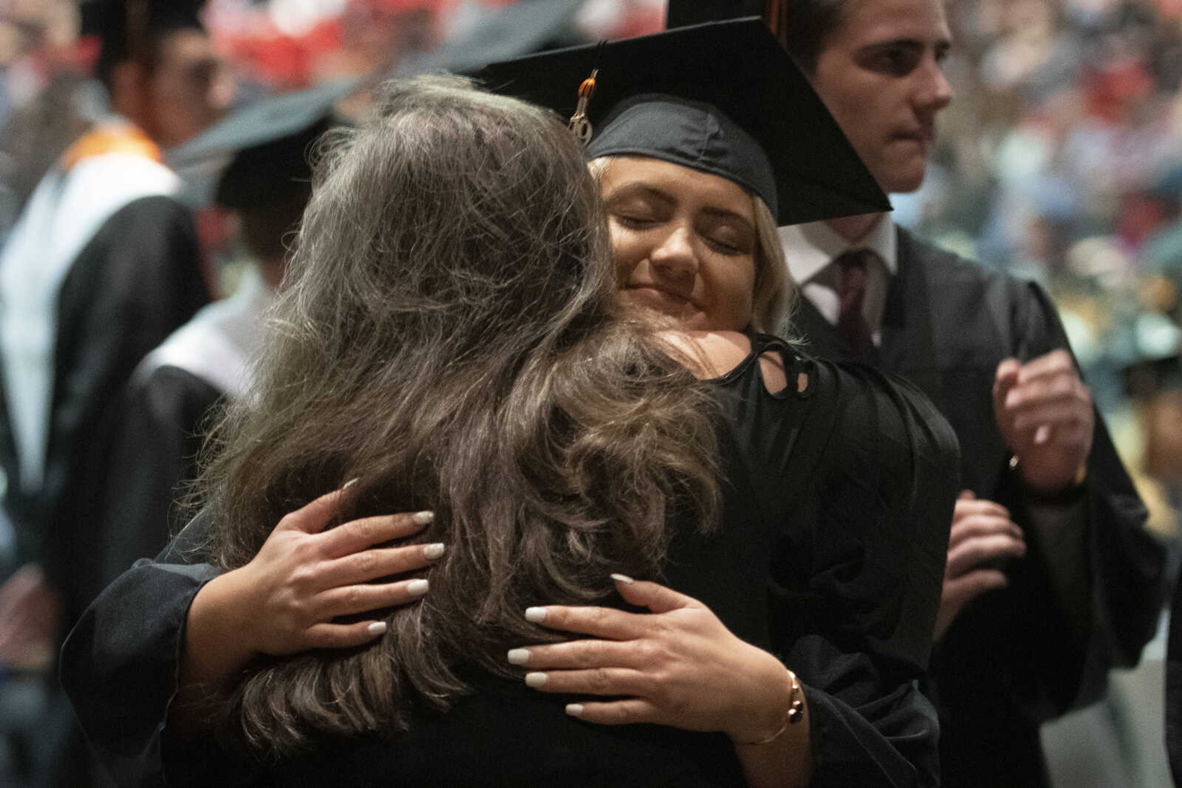 Cape Central's Lauren Beasley gets a hug shortly before walking across the stage during Cape Central High School's Class of 2019 Commencement on Sunday, May 12, 2019, at the Show Me Center in Cape Girardeau.