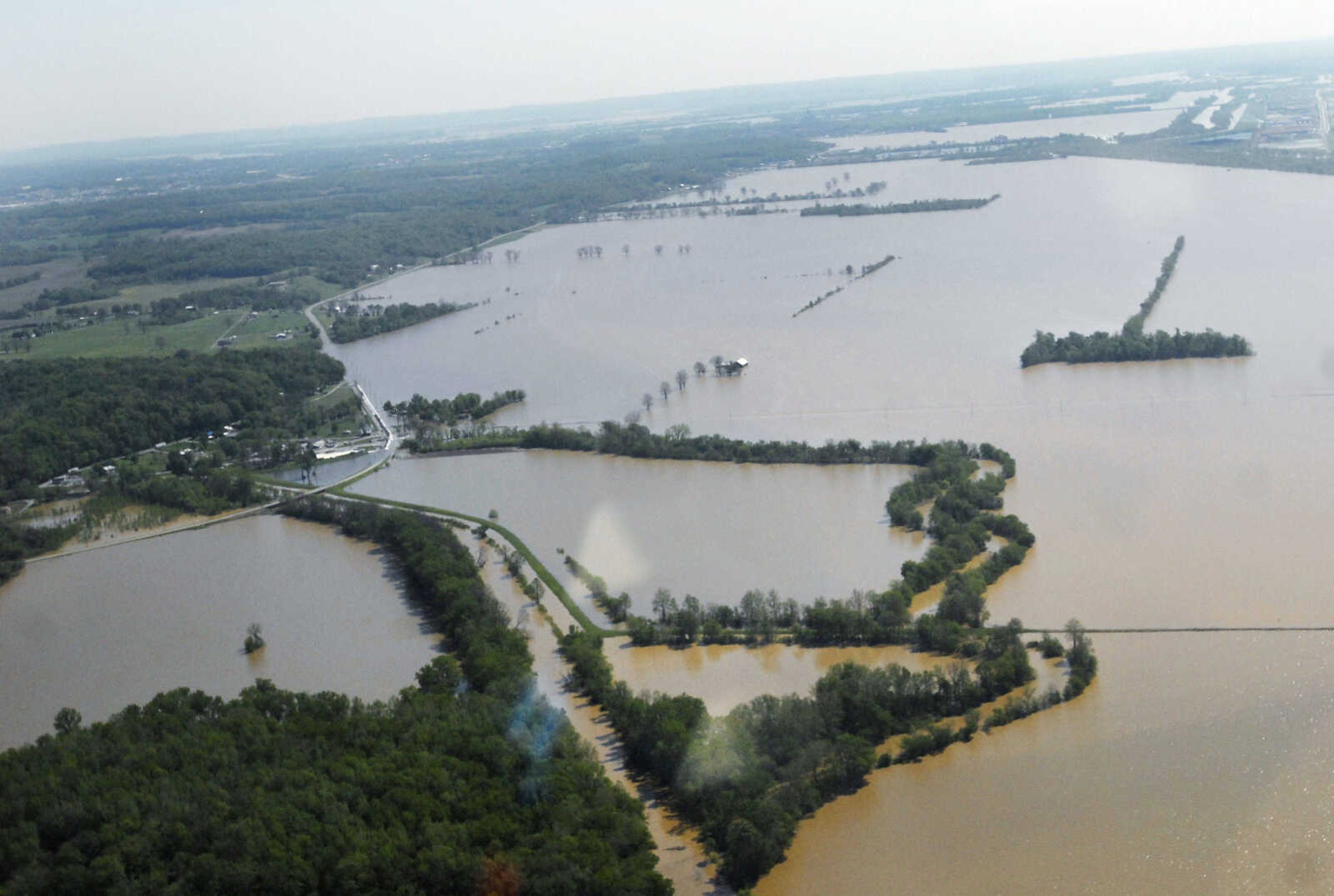 KRISTIN EBERTS ~ keberts@semissourian.com

Floodwater encroaches on Dutchtown, Mo., seen on the left, on Thursday, April 28, 2011.