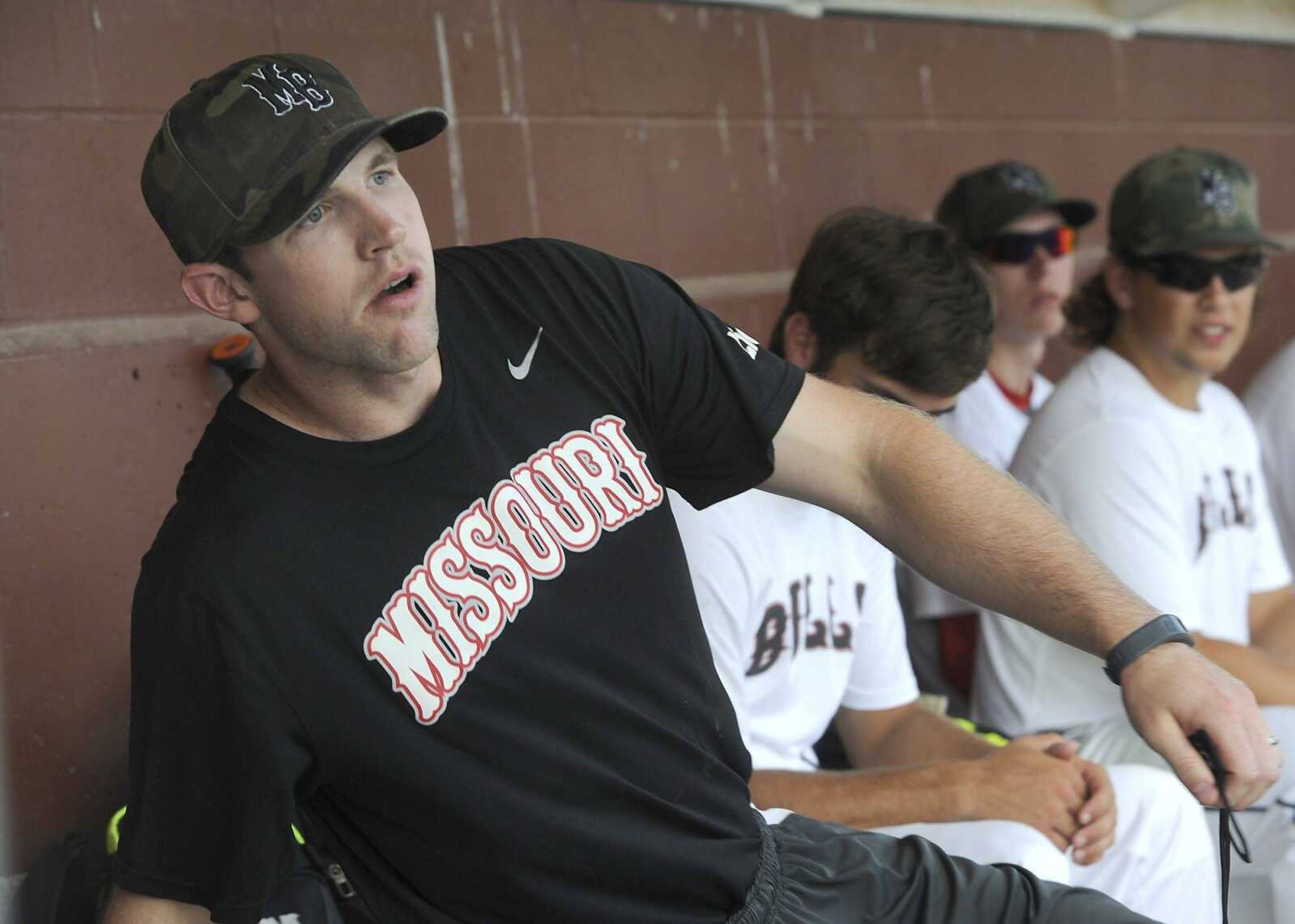 Lids Missouri Bulls 17u hitting coach Trenton Moses follows the action in a game Thursday, July 23, 2015 in St. Louis. Moses, a graduate of Advance High School, was the two-time OVC Player of the Year at Southeast Missouri State before being taken in the by the Atlanta Braves in the 26th round of the 2012 MLB draft. (Fred Lynch)