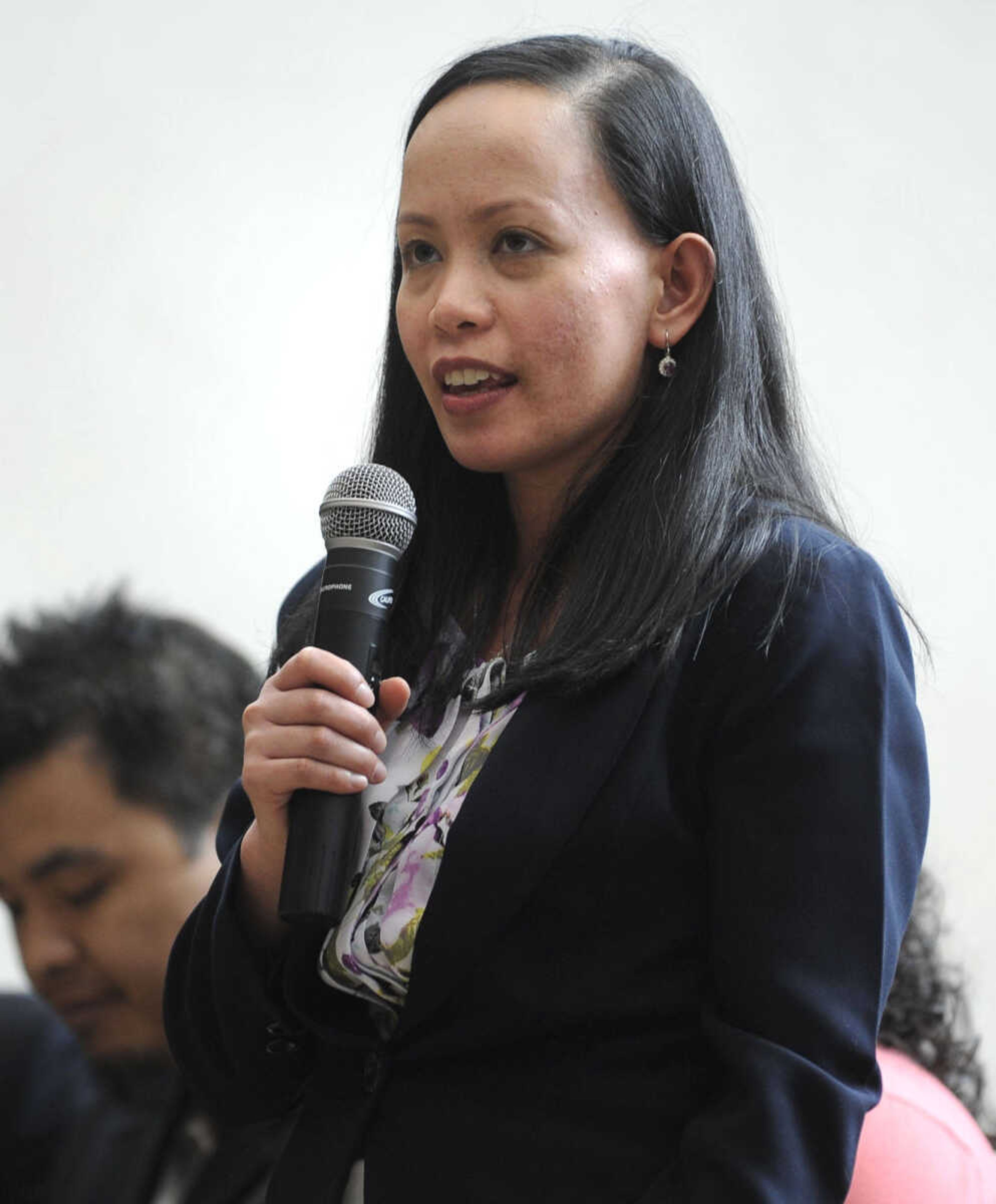 Mary Jane Sorima Norpel of the Philippines speaks during a naturalization ceremony Friday, May 2, 2014 at the Rush H. Limbaugh Sr. U.S. Courthouse in Cape Girardeau.