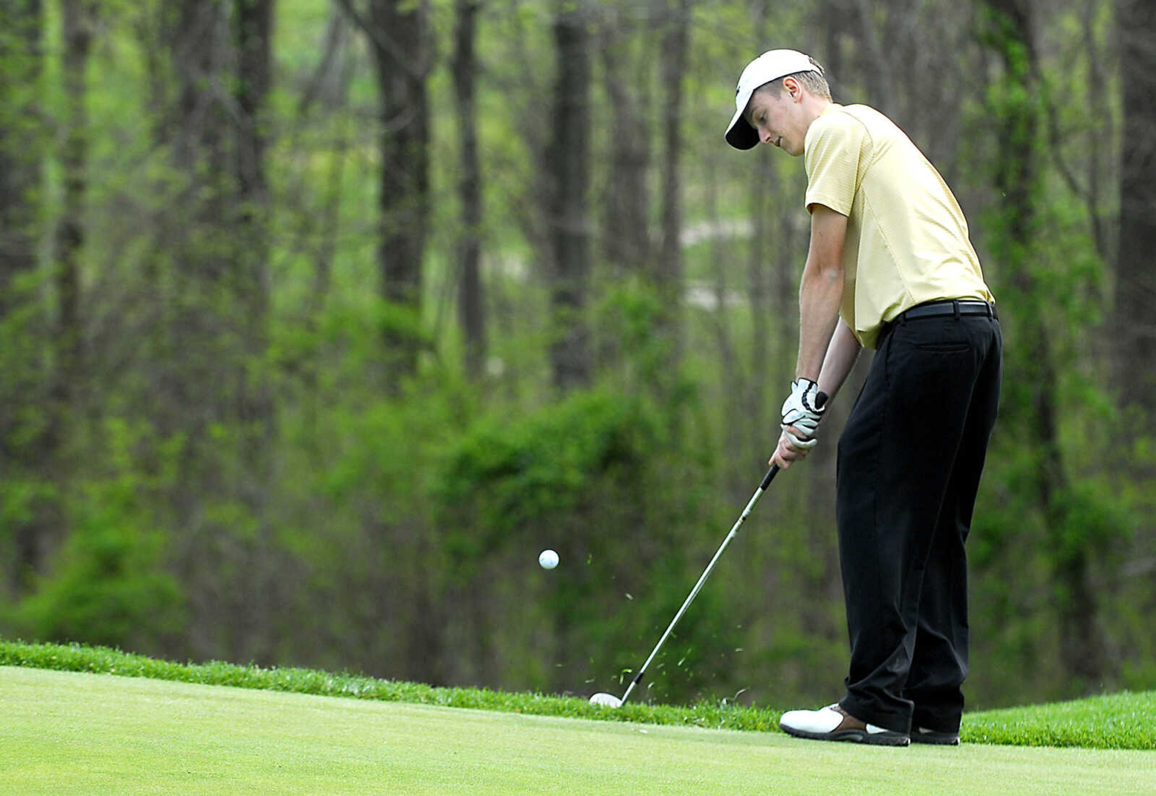 KIT DOYLE ~ kdoyle@semissourian.com
Saxony's Tyler James chips onto the 12th green Thursday, April 16, 2009, during the Saxony Lutheran Invitational at Dalhousie Golf Club in Cape Girardeau.