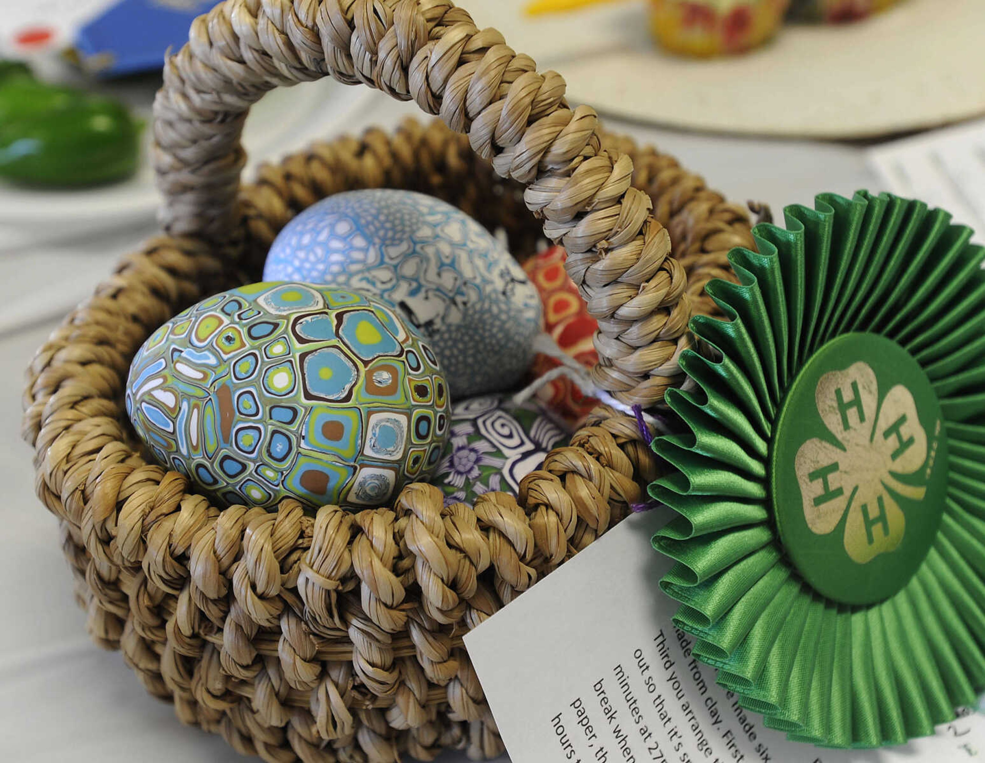 Alexis Goodson of Perryville, Missouri received the grand champion award and best of show for arts and crafts with her polymer clay eggs in the 4-H Club exhibit Sunday, Sept. 7, 2014 at the SEMO District Fair.