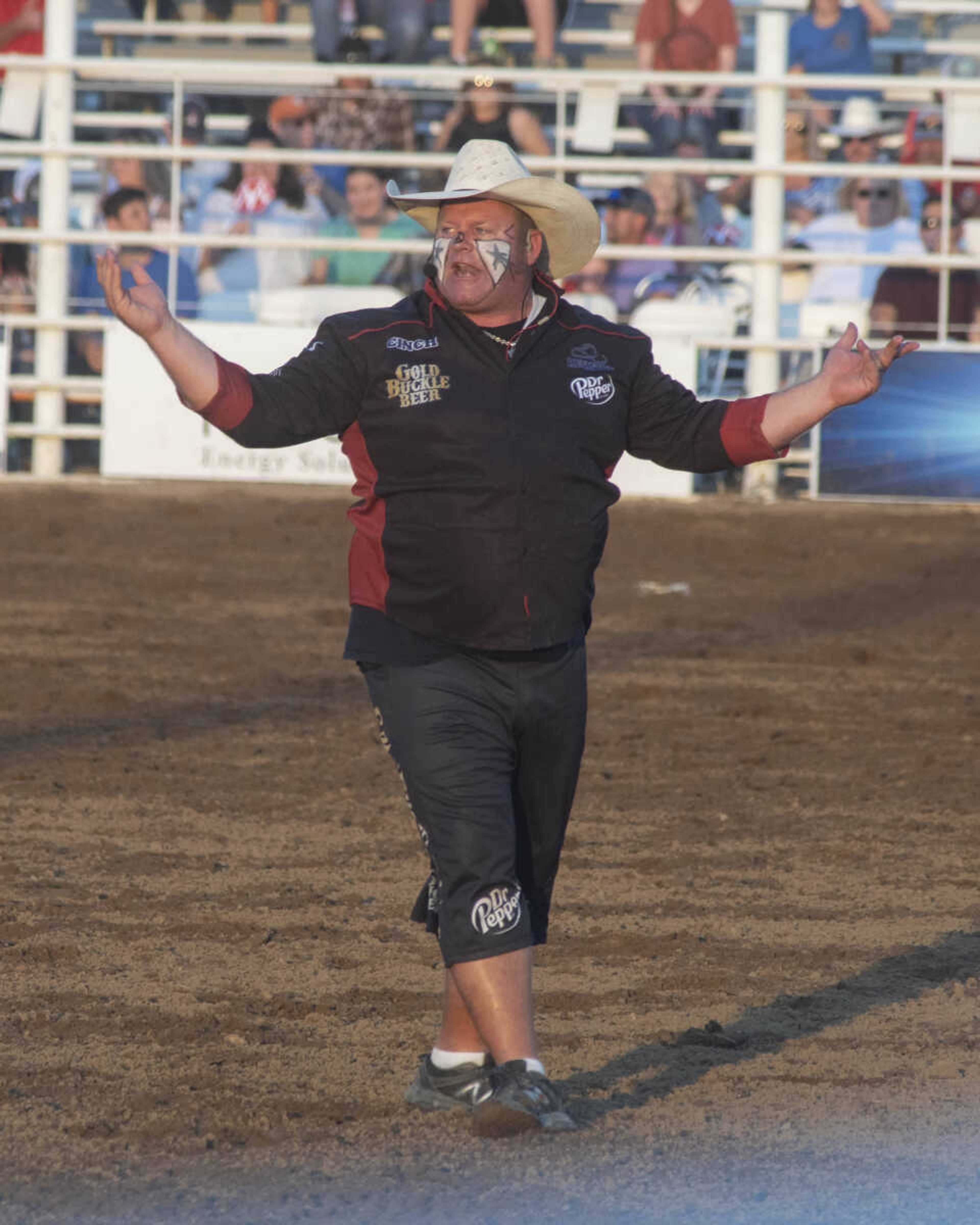 A bullfighter plays to the crowd during the Sikeston Jaycee Bootheel Rodeo on Thursday, Aug. 12, 2021, in Sikeston, Missouri.