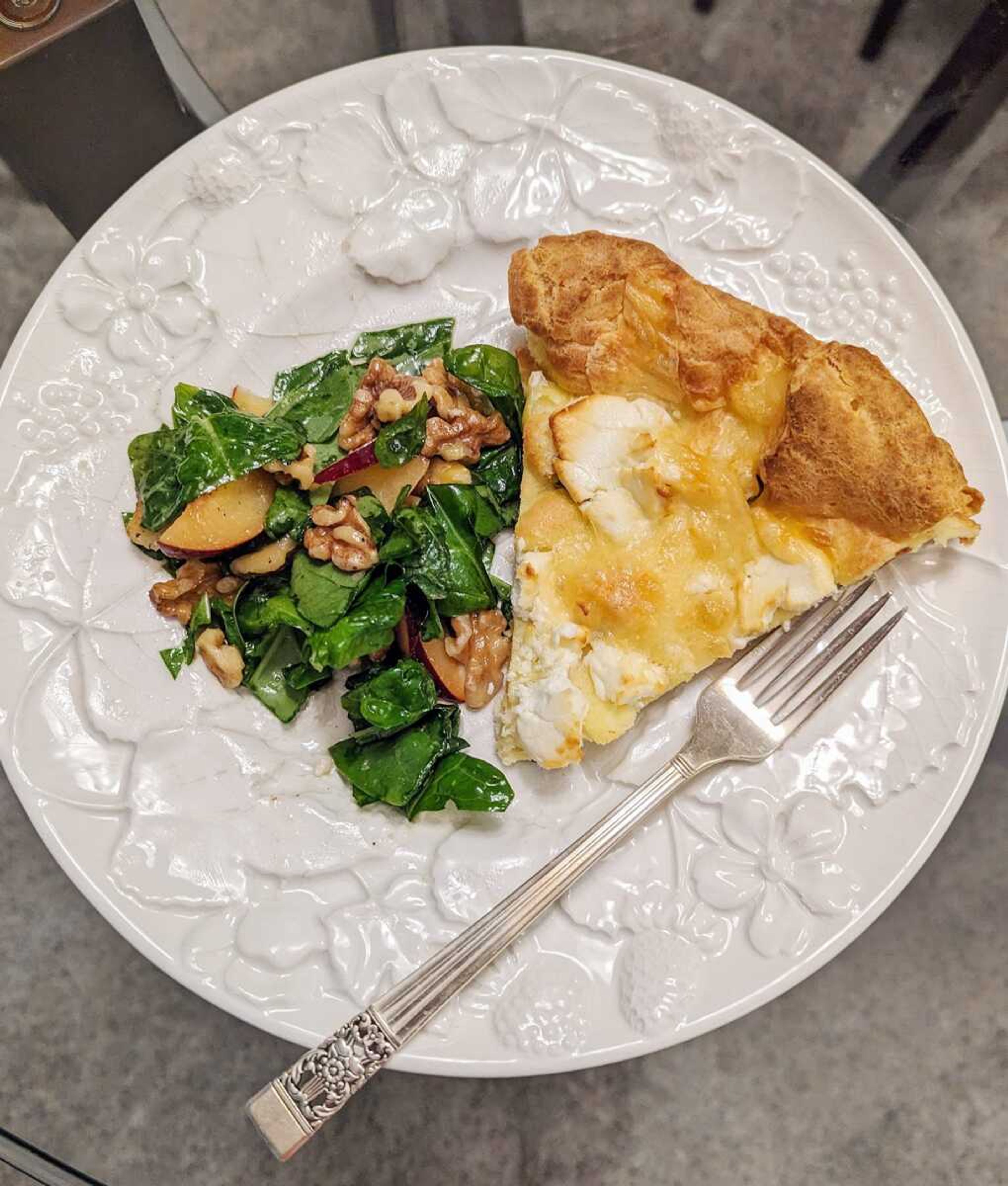 A wedge of a giant gougere, an easier alternative to individual savory cream puffs.