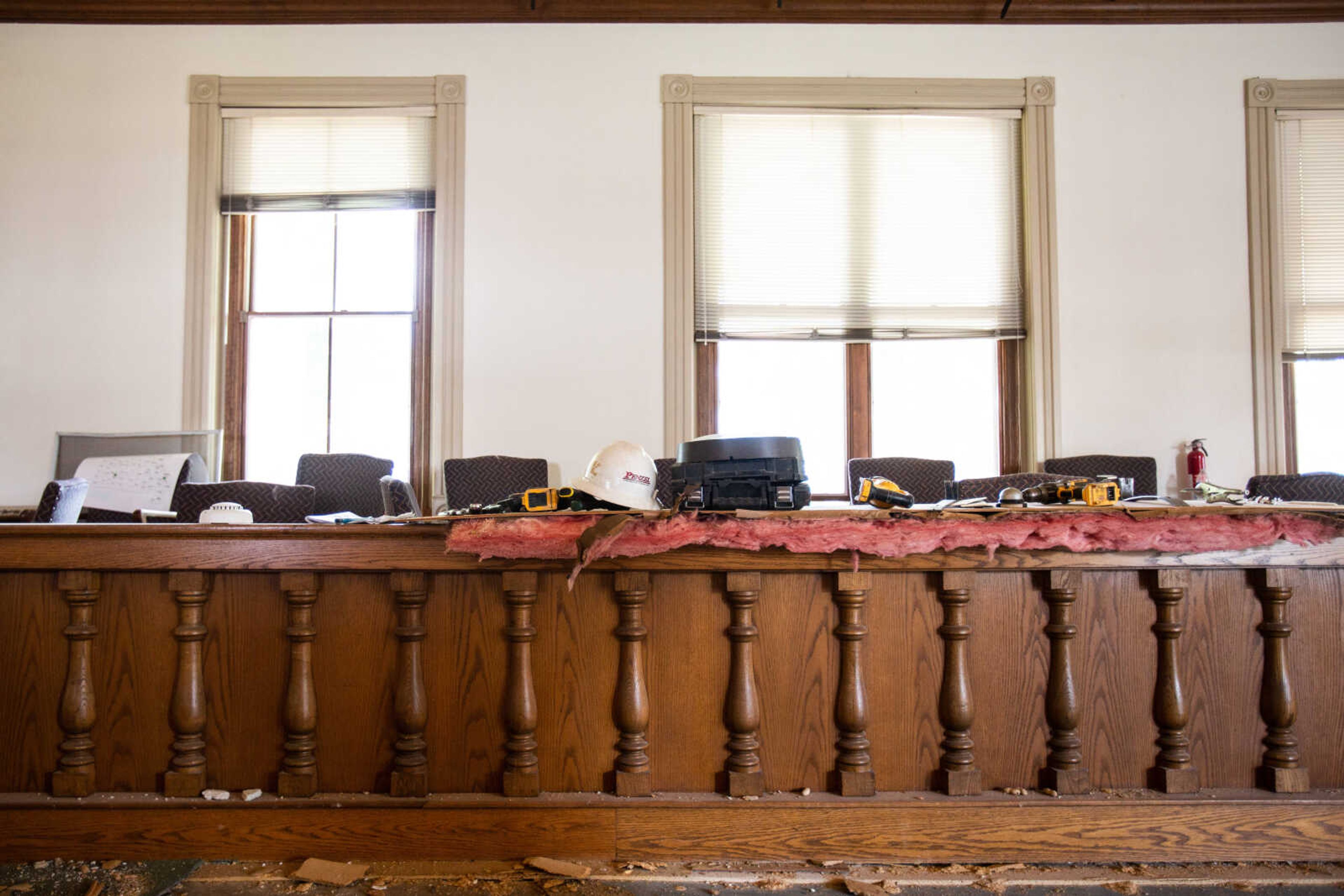 Tools and equipment are spread across the front of the old jury box as crews continue the demolition phase of the Common Pleas Courthouse renovation on Tuesday, June 16, 2020.