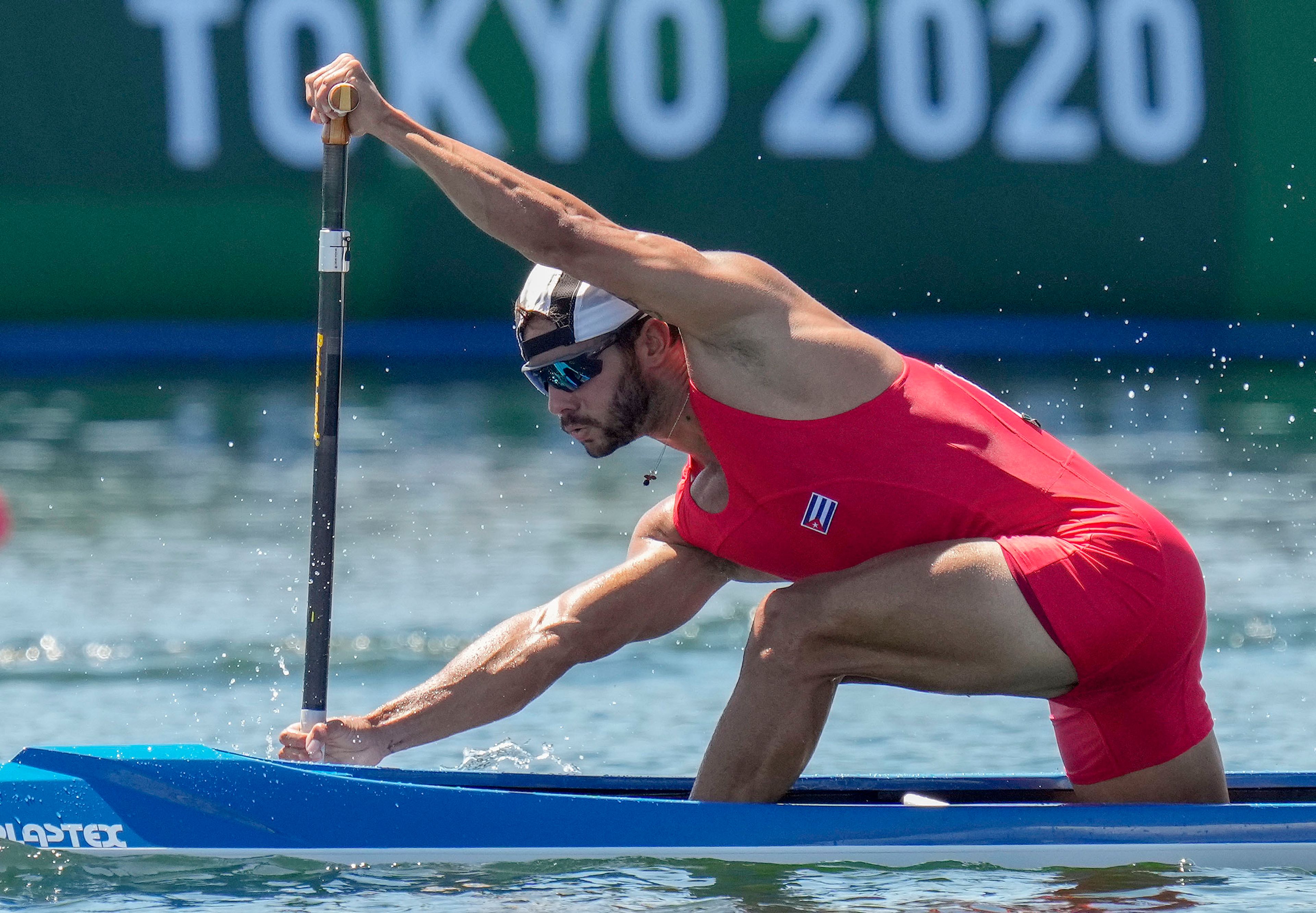 FILE - Fernando Dayan Jorge Enriquez, of Cuba competes in the men's canoe single 1000m heat during the 2020 Summer Olympics, Friday, Aug. 6, 2021, in Tokyo, Japan. (AP Photo/Kirsty Wigglesworth)