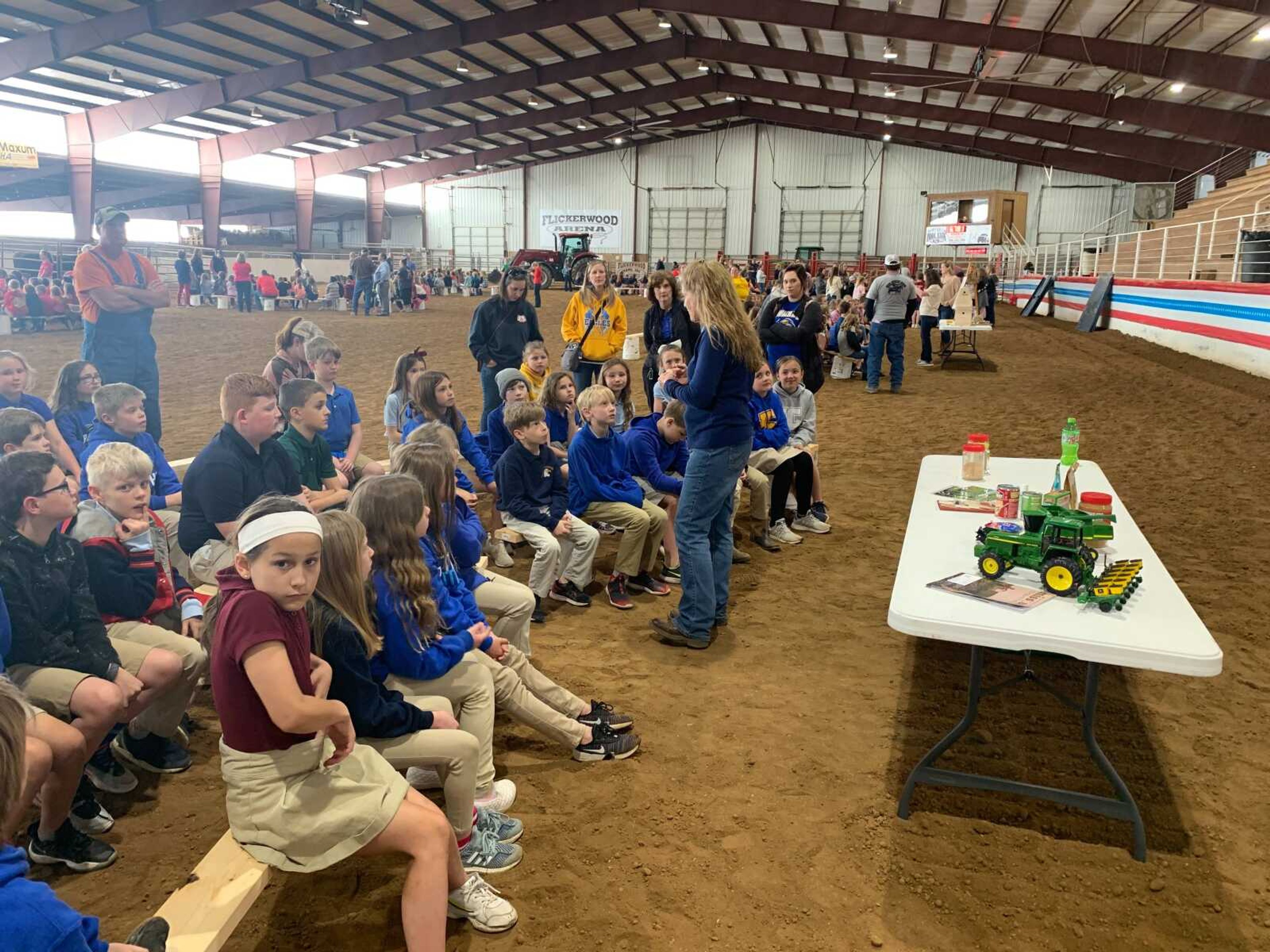 Susie Jahn explains the different uses we get from soybeans to Jackson Trinity students. A bushel of soybeans weighs 60 pounds and contains 27 pounds of protein.&nbsp;