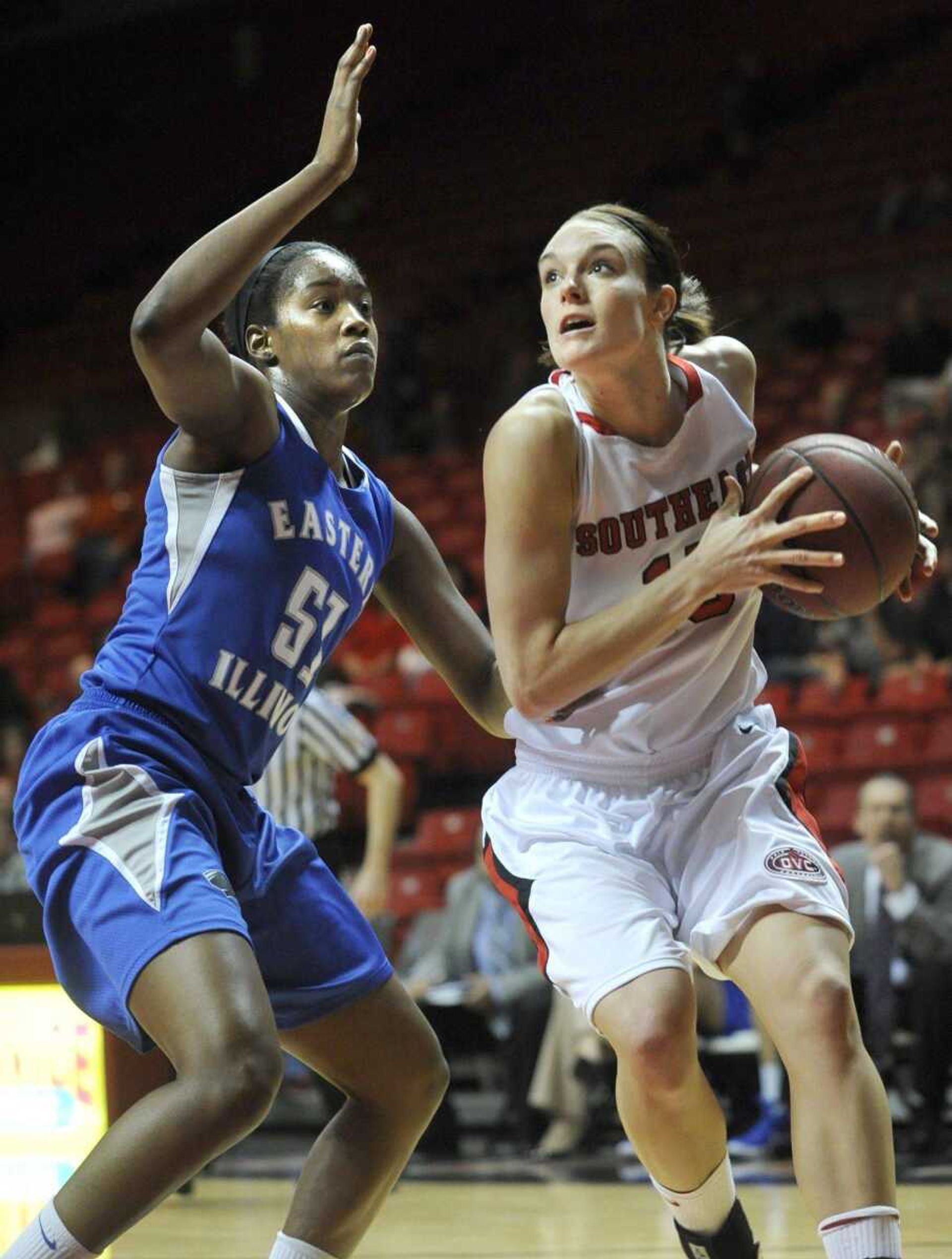 Southeast Missouri State's Courtney Shiffer drives to the basket against Eastern Illinois' Mariah King during the first half Saturday, Jan. 14, 2012 at the Show Me Center. (Fred Lynch)