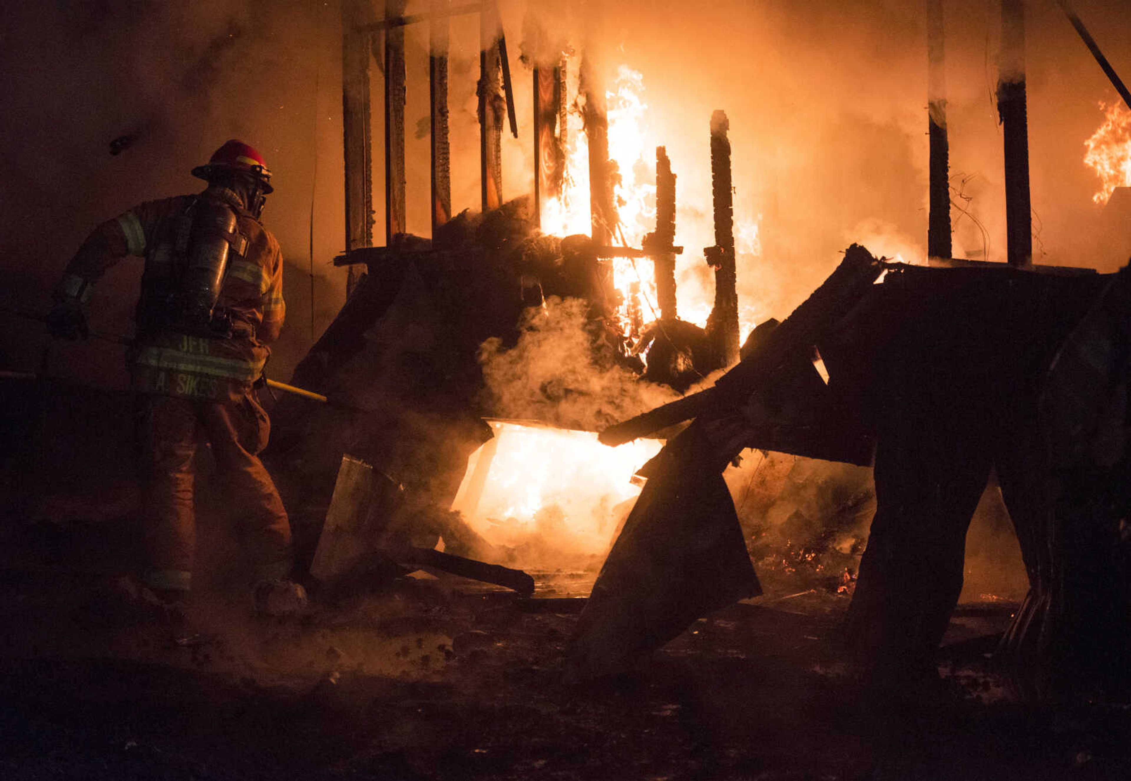 Firefighters respond to a house fire early Wednesday, Jan. 3, 2018, at 322 Estate Drive in Cape Girardeau. 