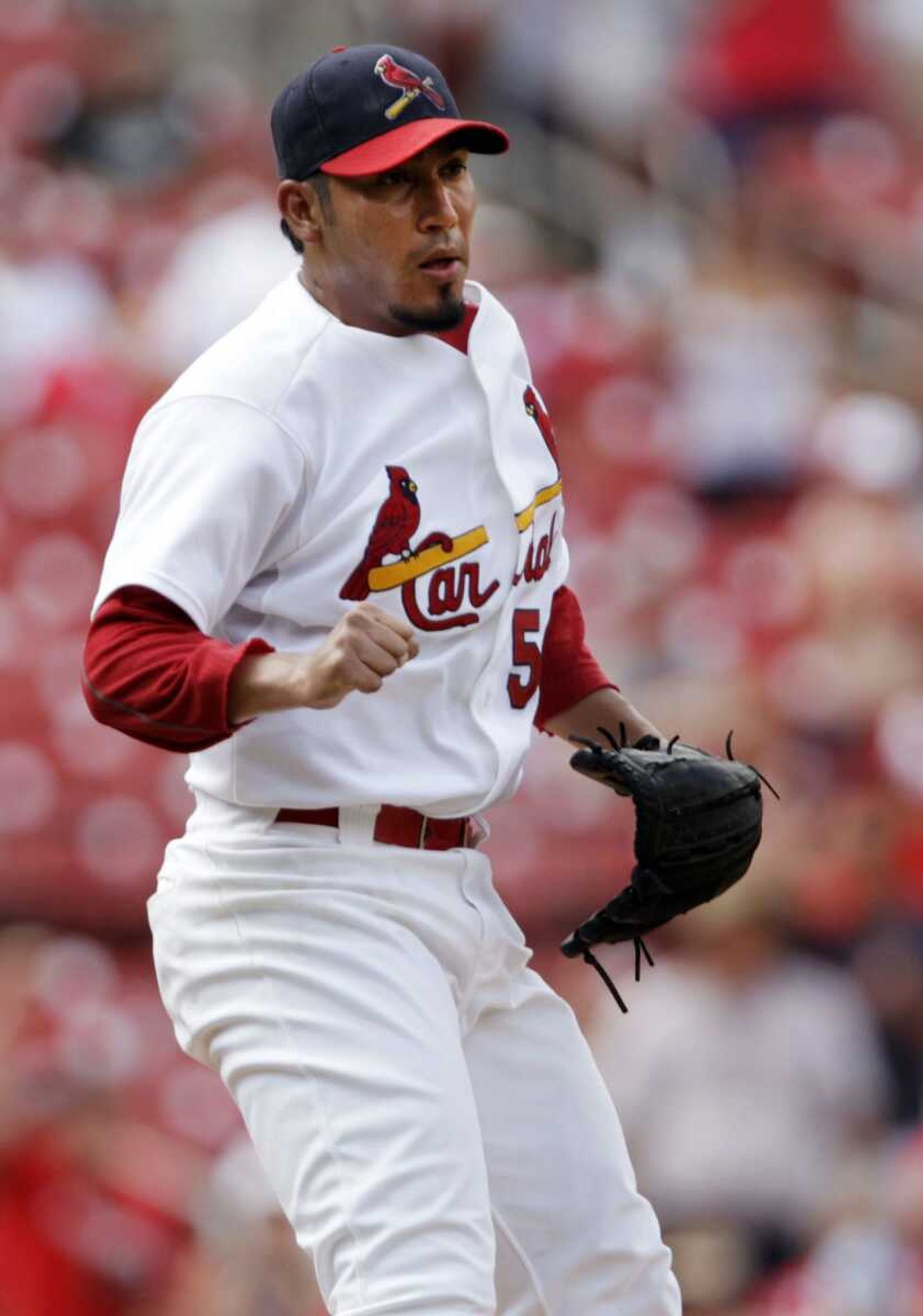 St. Louis Cardinals relief pitcher Fernando Salas celebrates after finishing off the Arizona Diamondbacks in the ninth inning of a baseball game, Sunday, July 10, 2011 in St. Louis. Salas collected his 16th save of the season as the Cardinals beat the Diamondbacks 4-2.(AP Photo/Tom Gannam)