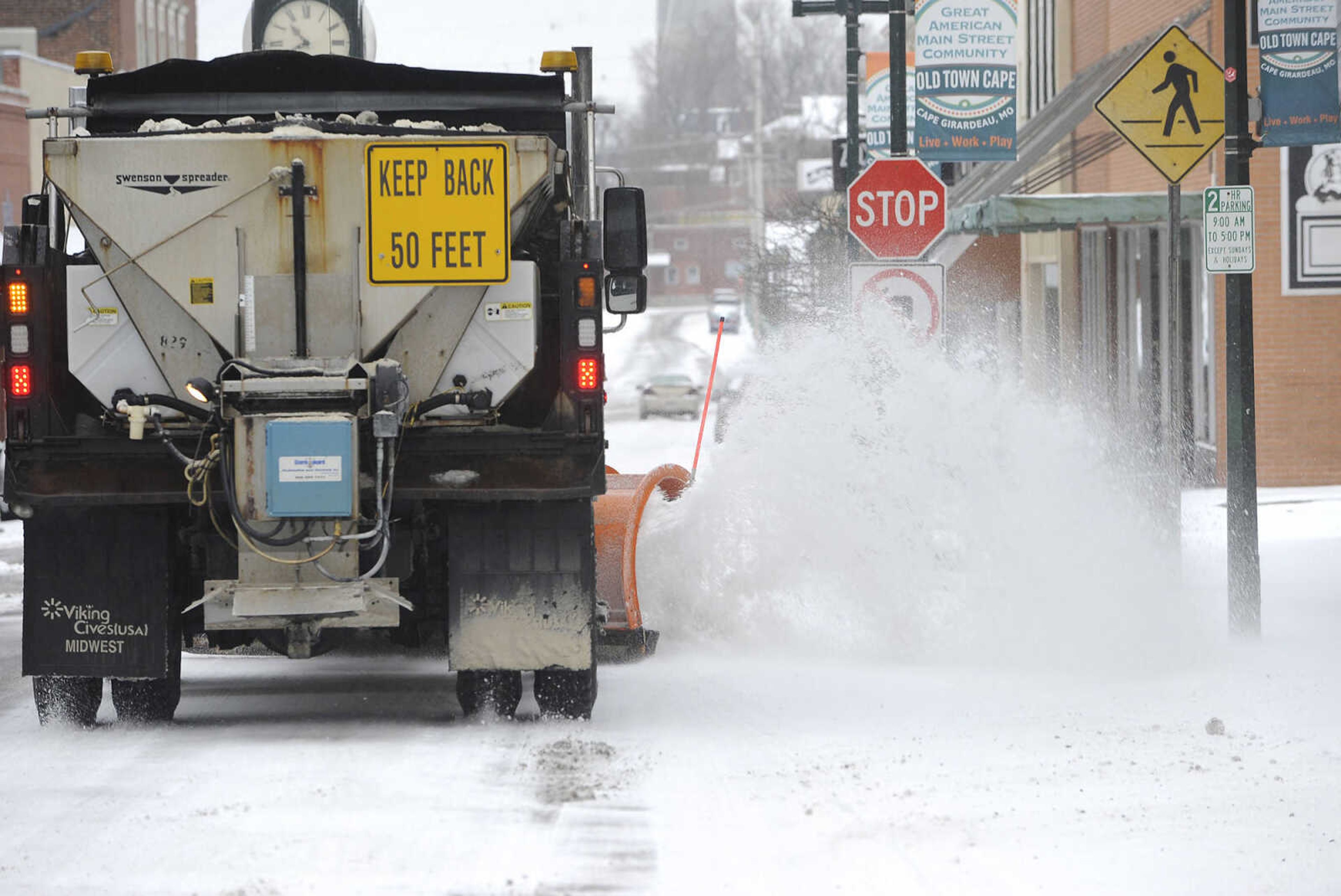 FRED LYNCH ~ flynch@semissourian.com
A snow plow makes a run on Main Street Sunday morning, Feb. 14, 2016 in downtown Cape Girardeau.