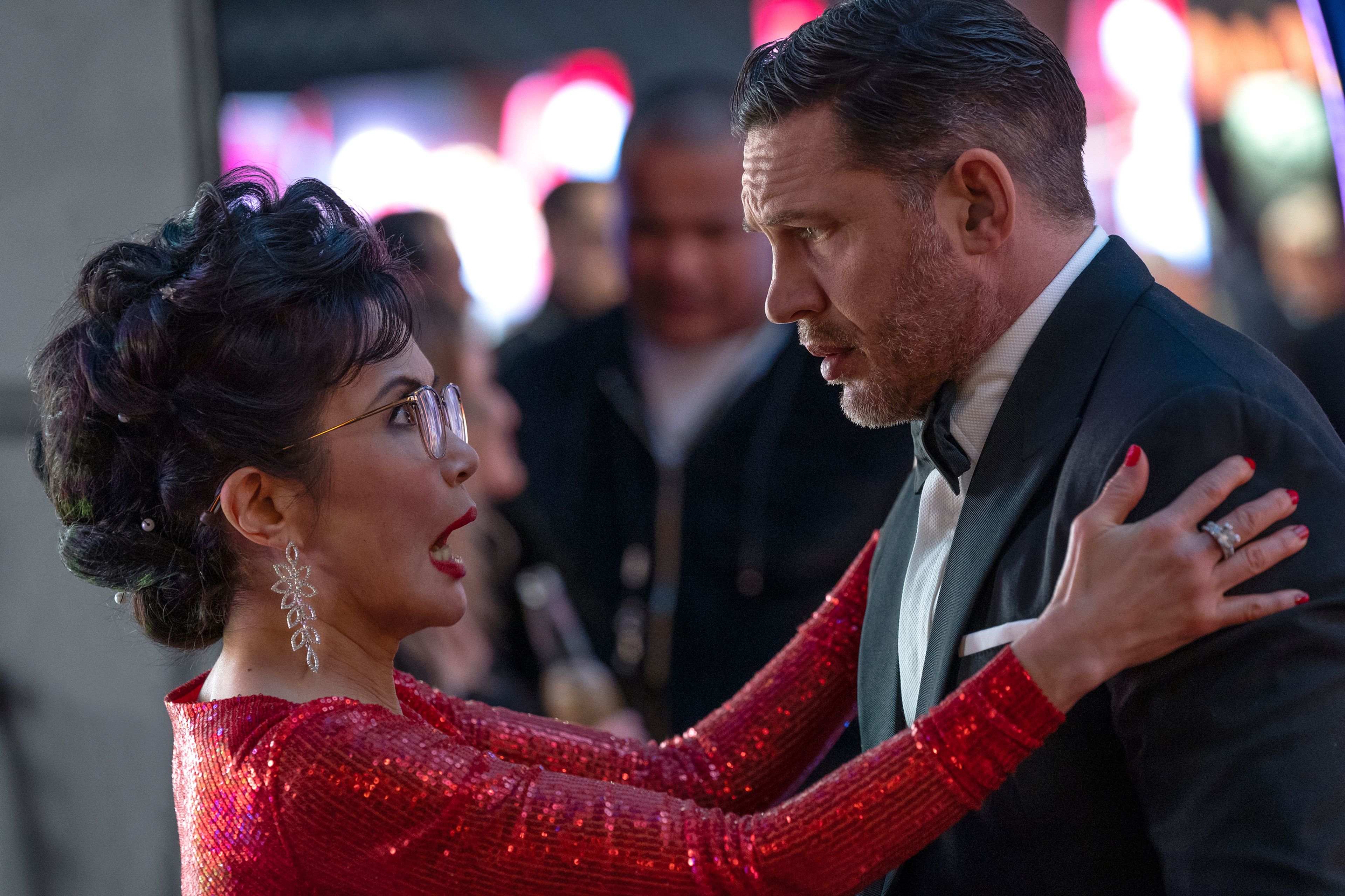 This image released by Sony Pictures shows Peggy Lu, left, and Tom Hardy in Columbia Pictures' "Venom:The Last Dance." (Lacey Terrell /Columbia-Sony Pictures via AP)