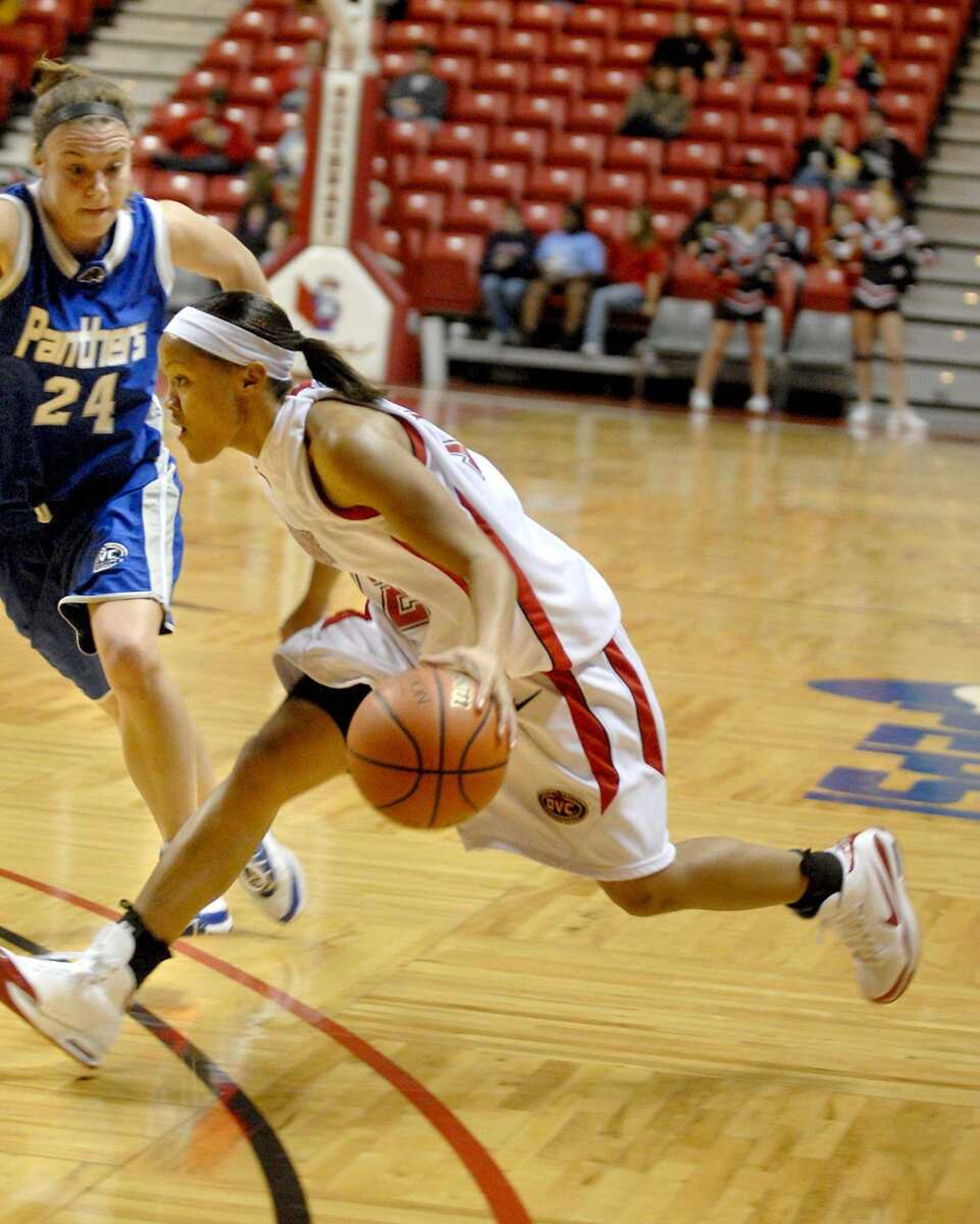 ELIZABETH DODD ~ edodd@semissourian.com
Southeast Missouri's Tarina Nixon makes a drive for the basket against Eastern Illinois' Ashley Thomas in the second half Saturday night at the Show Me Center.