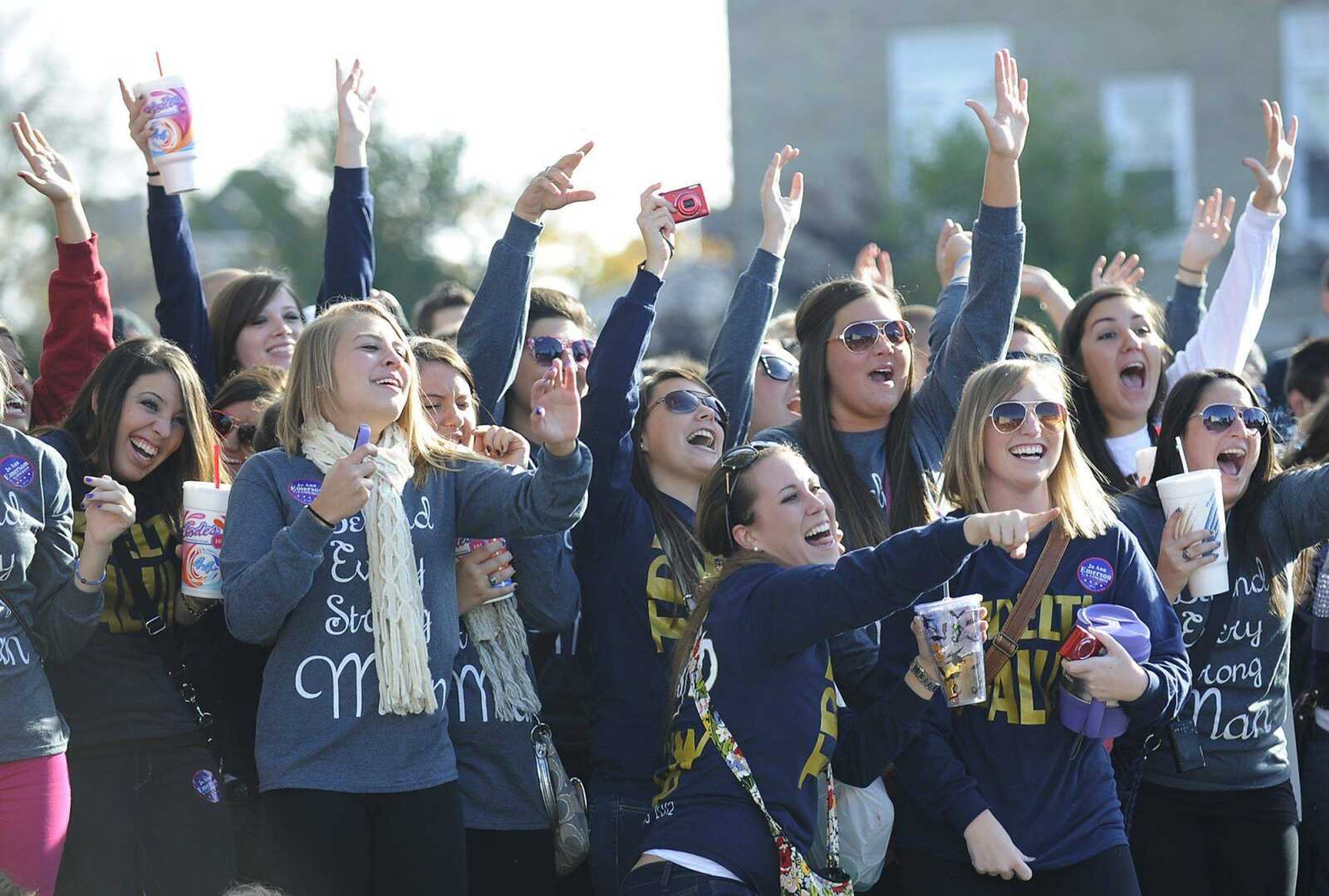 Southeast Missouri State University students cheer during the SEMO Homecoming parade Saturday, October 20. (ADAM VOGLER)