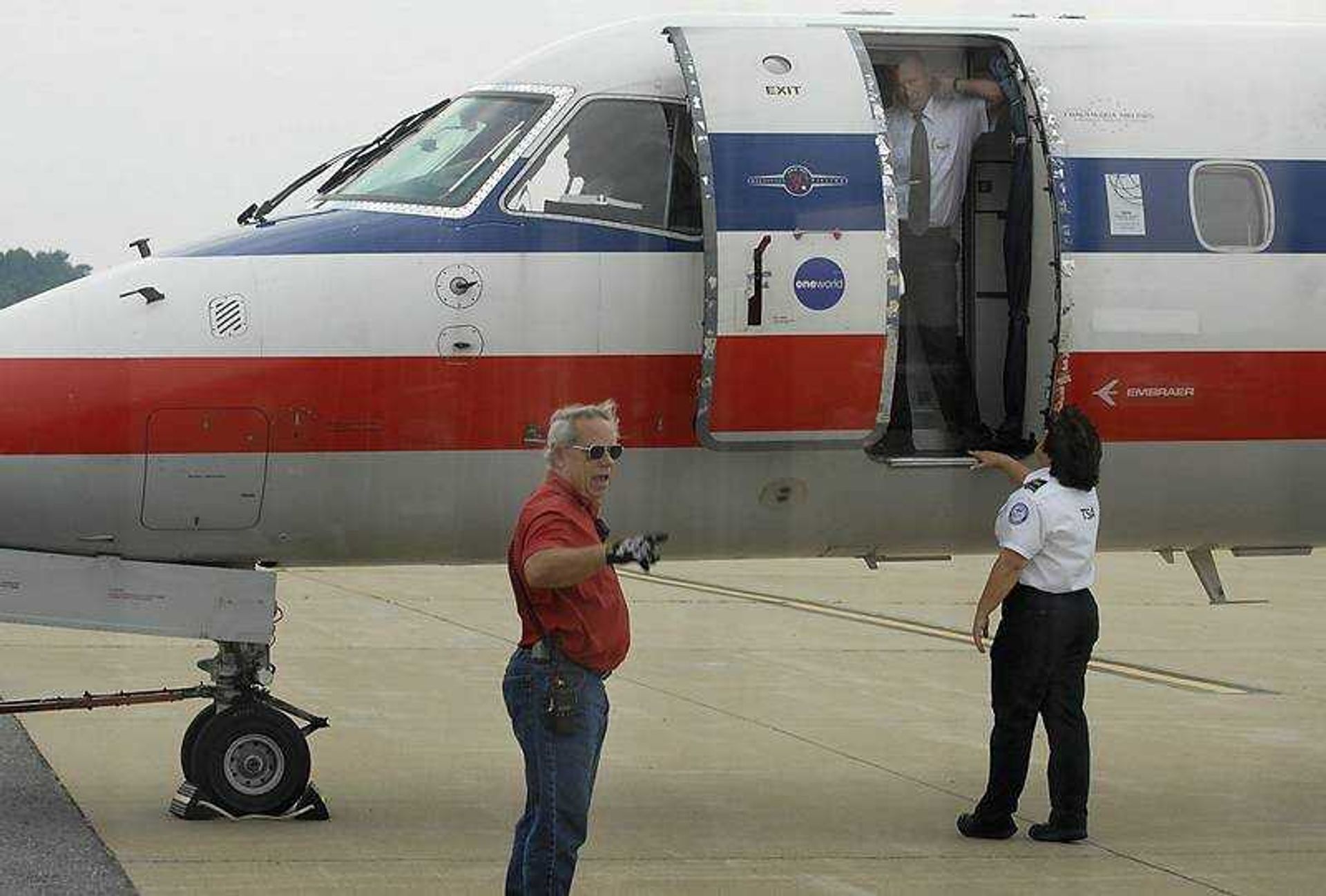 KIT DOYLE ~ kdoyle@semissourian.com
Cape Girardaeu Regional Airport personnel prepared to deboard an American Connection flight early Friday, July 24, 2008, following an emergency landing due to a cracked windshielf. The plane was en route from New Orleans to St. Louis.