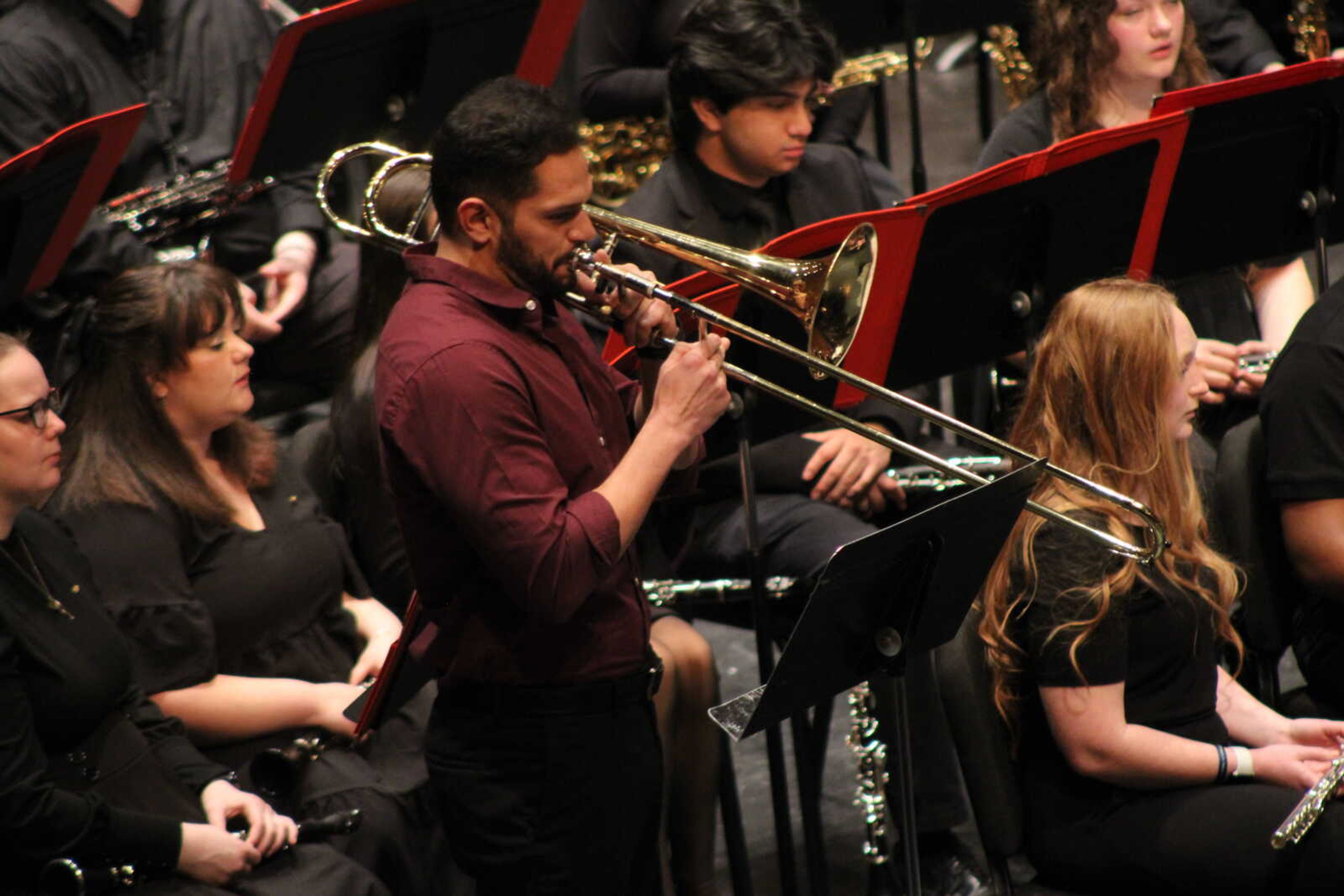 Assistant Professor of Trombone, Felipe Brito plays his solo during "Red Sky" with the Southeast Wind Symphony&nbsp;