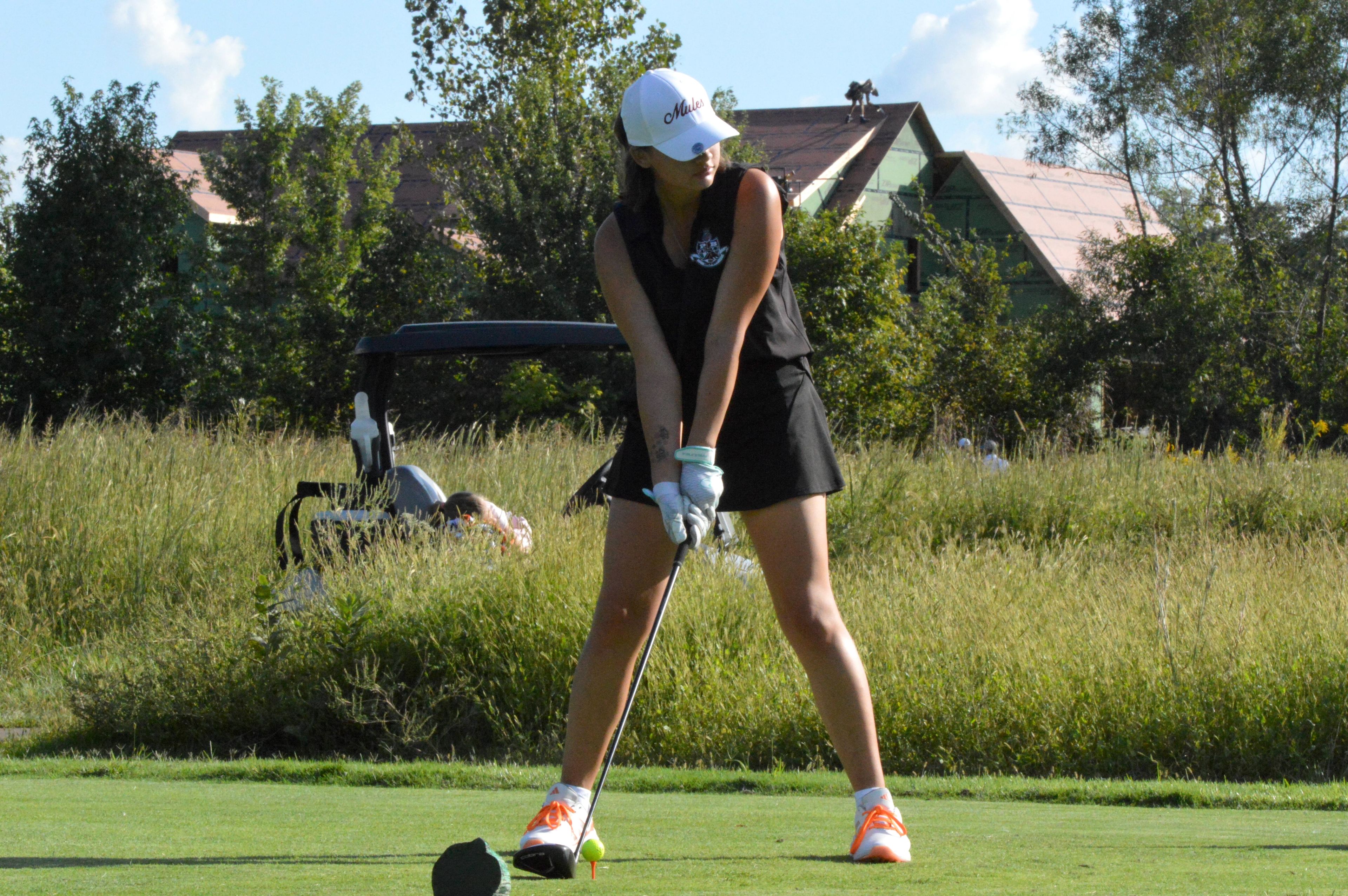 Poplar Bluff junior Baella Ballard eyes down the fairway before teeing off in the Notre Dame quad-meet on Thursday, Sept. 26. 