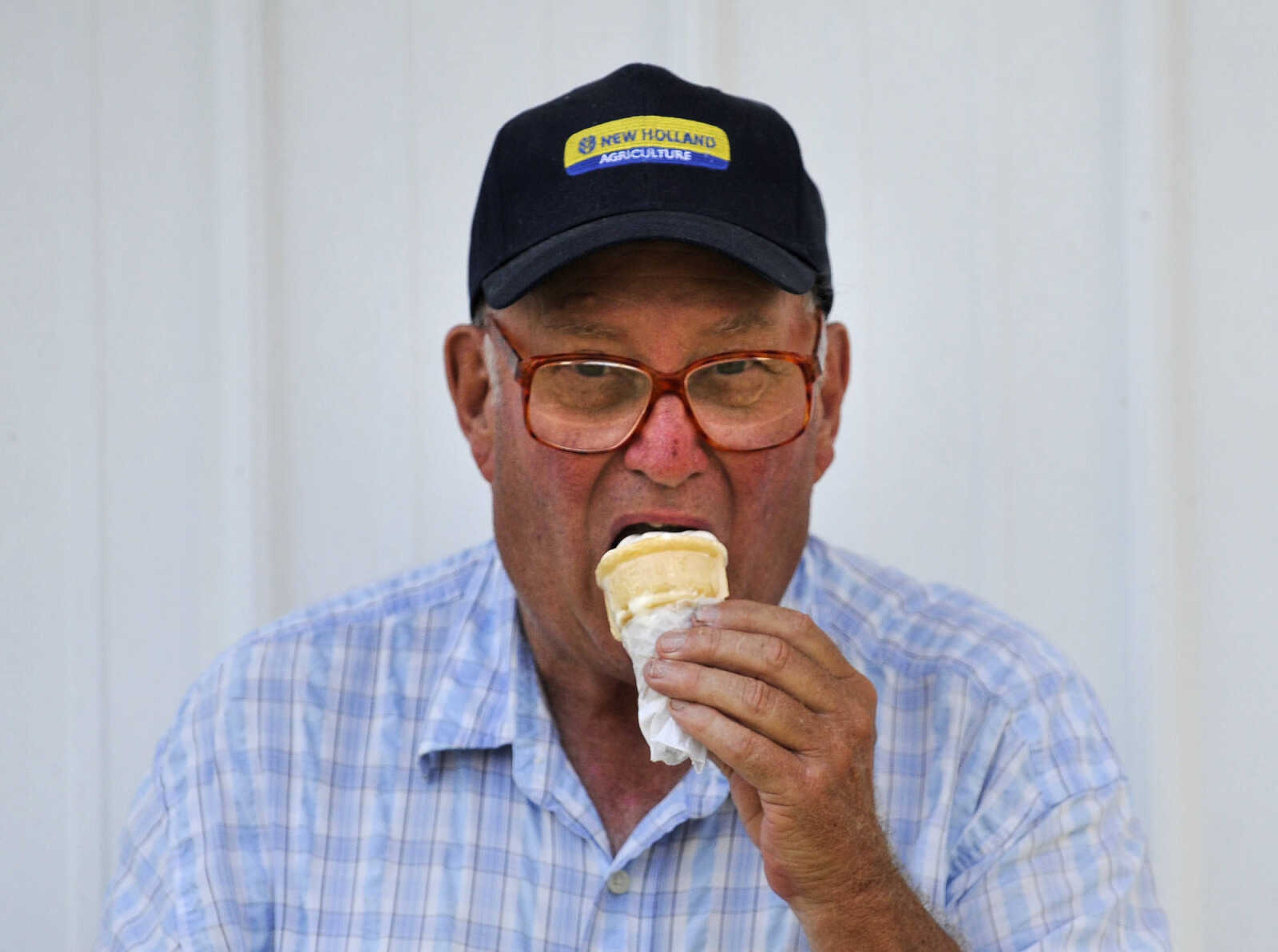 LAURA SIMON ~ lsimon@semissourian.com

Carl Ehlers cools off with an ice cream cone on Wednesday, Sept. 14, 2016, during the SEMO District Fair at Arena Park in Cape Girardeau.