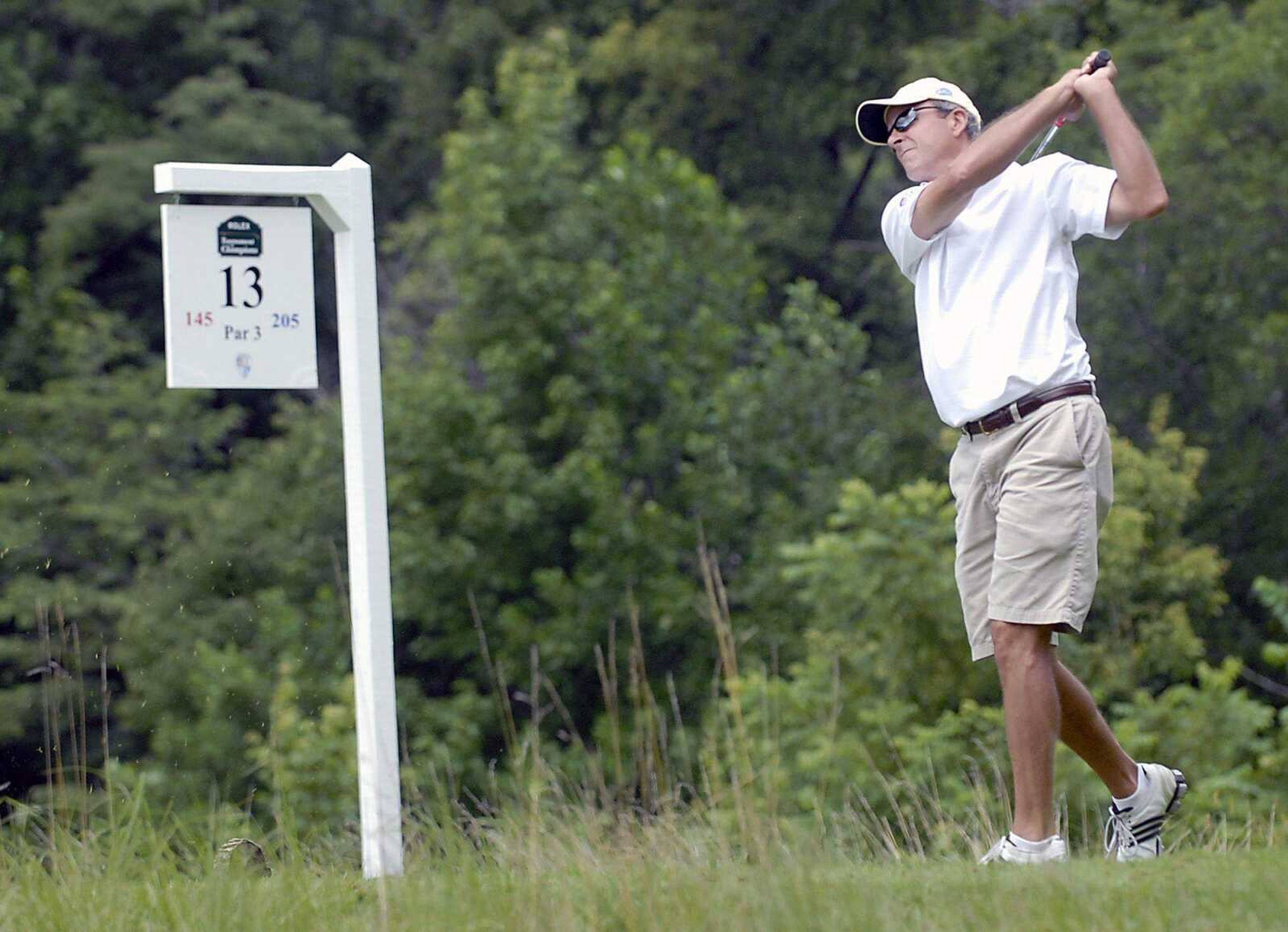 Ben Cantrell of Cape Girardeau watches his 13th hole tee shot Wednesday during the Missouri Amateur Stroke Play Championship at Dalhousie Golf Club. (Kit Doyle)