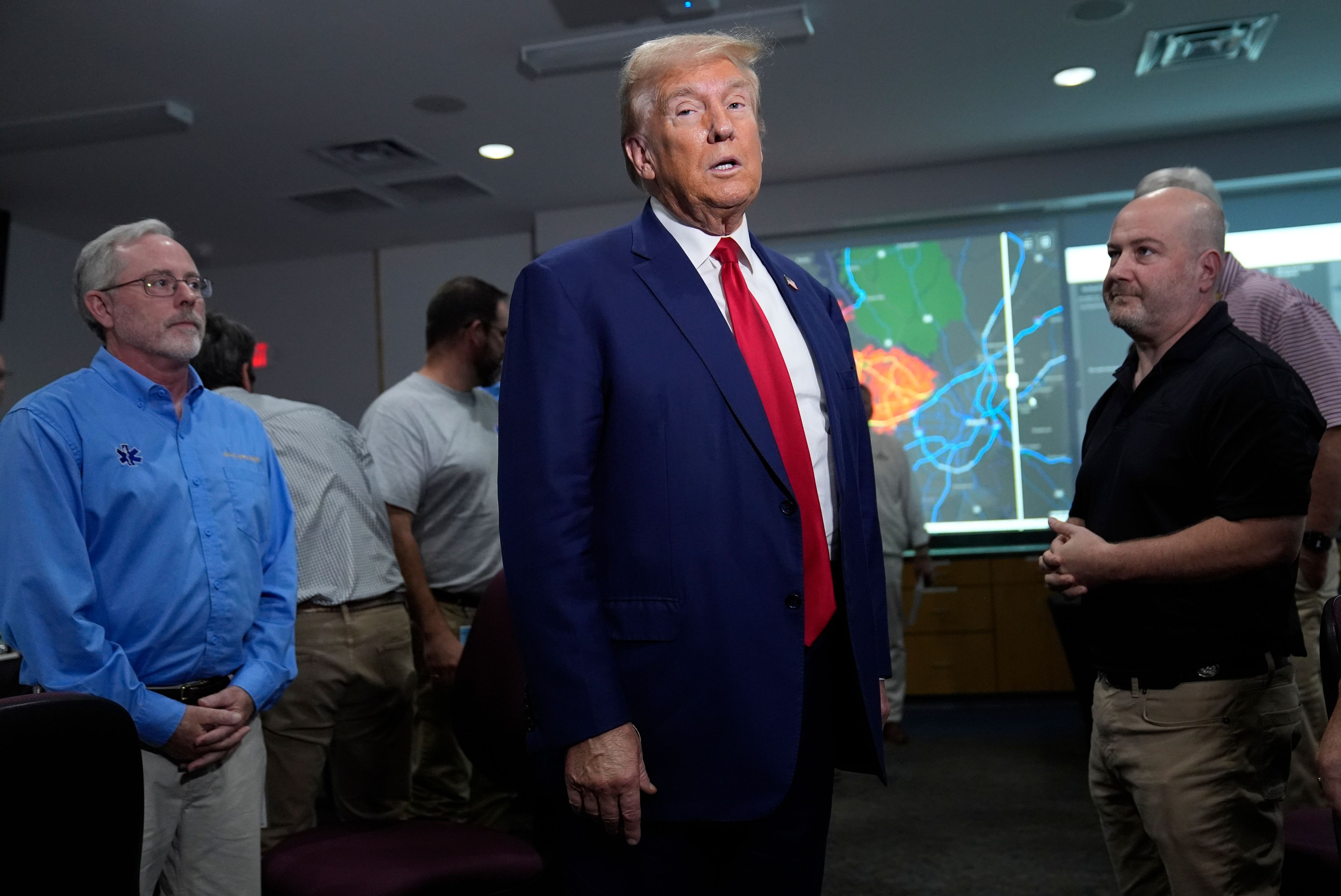 Republican presidential nominee former President Donald Trump arrives for a briefing at the Columbia County Emergency Management Agency as he visits areas impacted by Hurricane Helene, Friday, Oct. 4, 2024, in Evans, Ga. (AP Photo/Evan Vucci)