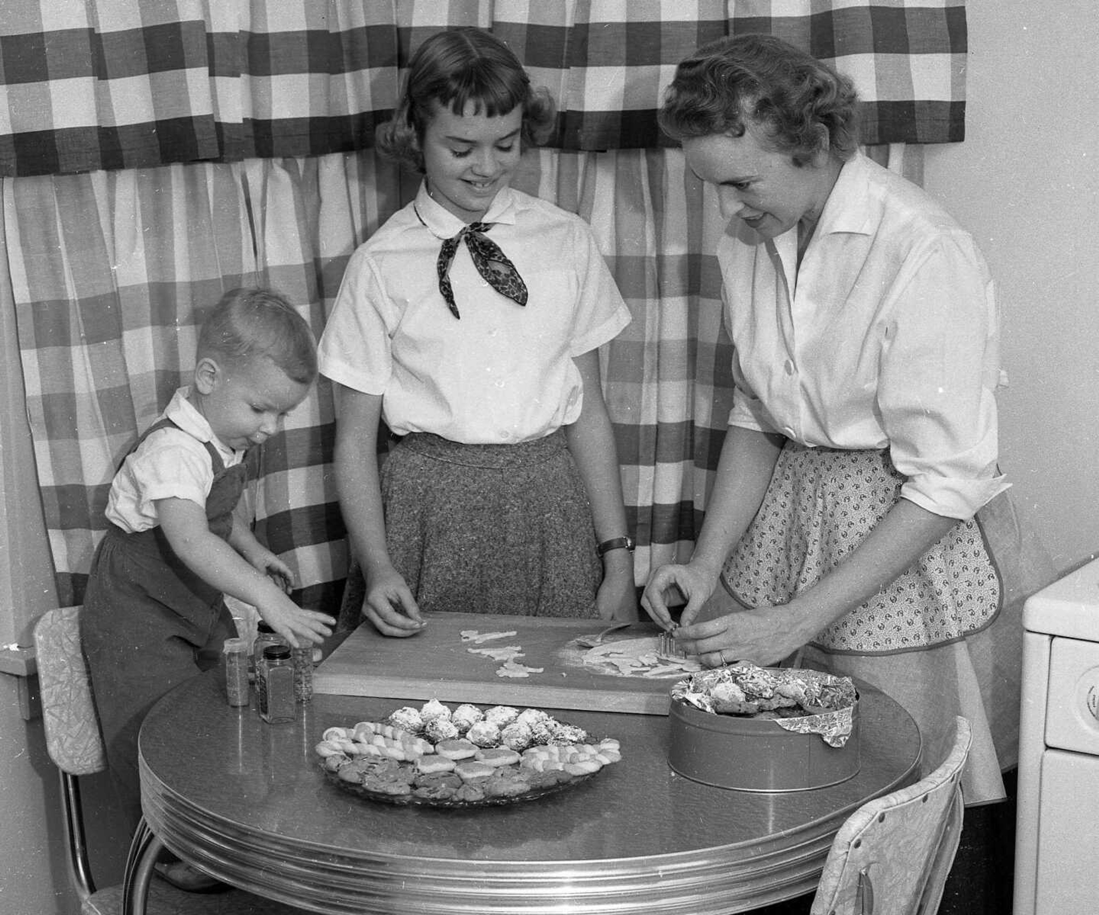 Lainie Bohnsack Thomas recognized her family in this photo: "We noticed the 'Pictures of the Past' section in the newspaper (Sunday the 22nd). That is our family in the photo! The little boy is my dad, Robert 'Bob' Bohnsack, his sister Susan Cole and my late grandmother, Laura 'Larry' Bohnsack. We are guessing the photo looks to be taken around 1956 or so, since Bob was born in 1954. Very cool to see them in the paper!"