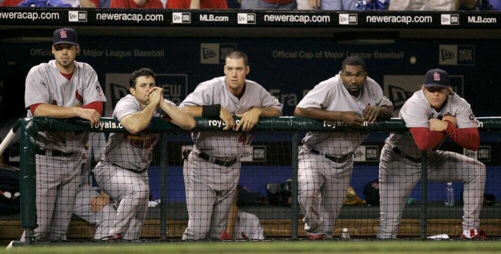 St. Louis Cardinals players watched the final at bat in their 8-1 loss to the Kansas City Royals on Tuesday. (Charlie Riedel ~ Associated Press)