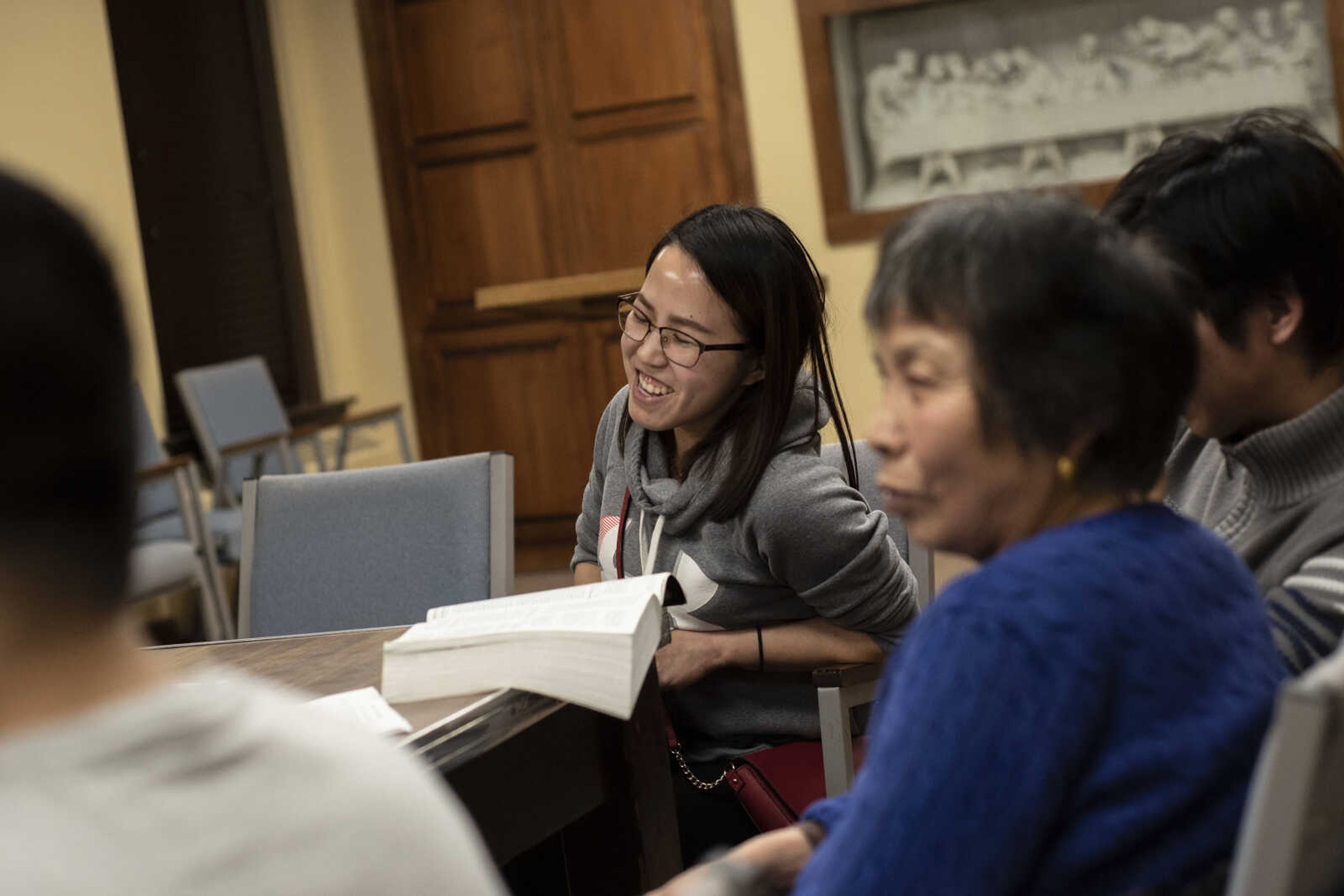 Chaonan (Estelle) Teng reacts to a conversation during the weekly Mandarin- and English-spoken Bible study Friday, March 8, 2019, at the Southeast Missouri State University Baptist Student Center in Cape Girardeau.