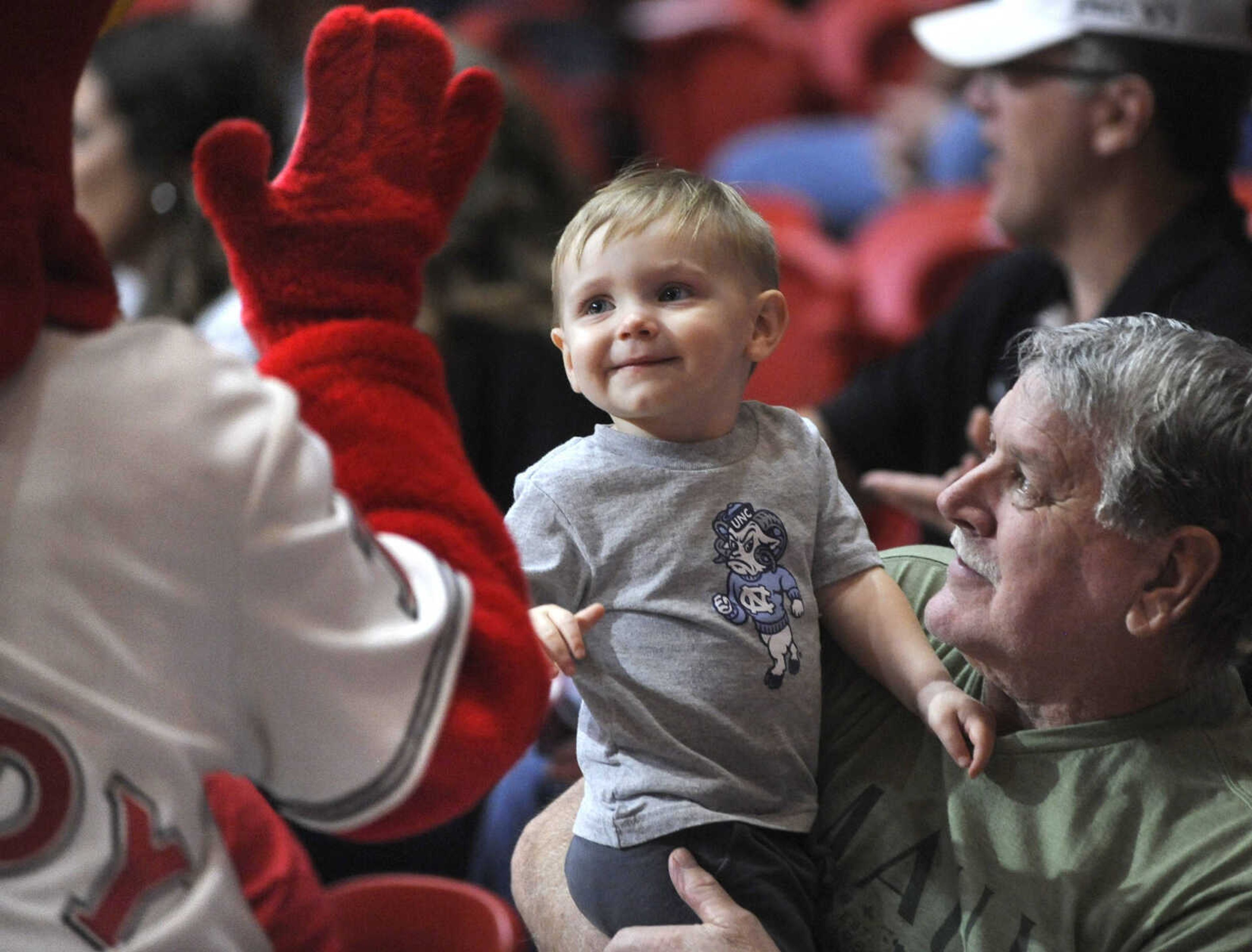 FRED LYNCH ~ flynch@semissourian.com
Carter Rayburn and his grandfather, Richard Rayburn, meet Rowdy Redhawk at the Southeast Missouri State-Eastern Illinois men's basketball game Saturday, Jan. 21, 2017 at the Show Me Center.