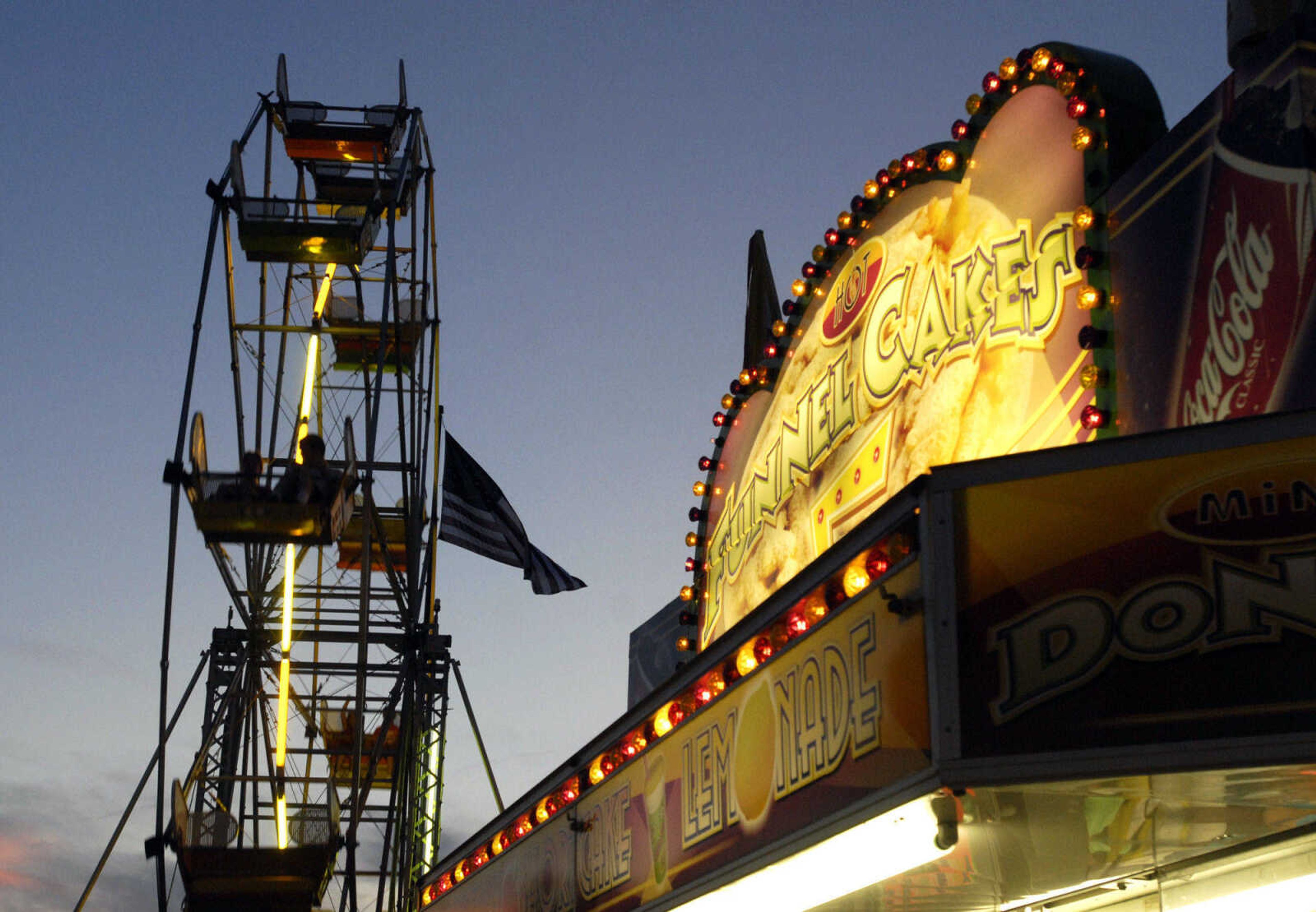 KRISTIN EBERTS ~ keberts@semissourian.com

The ferris wheel is silhouetted against the sky after sunset at the 102nd Annual Homecomers Celebration in downtown Jackson on Tuesday, July 27, 2010. Tuesday marked the opening day of the celebration, which lasts through Saturday.