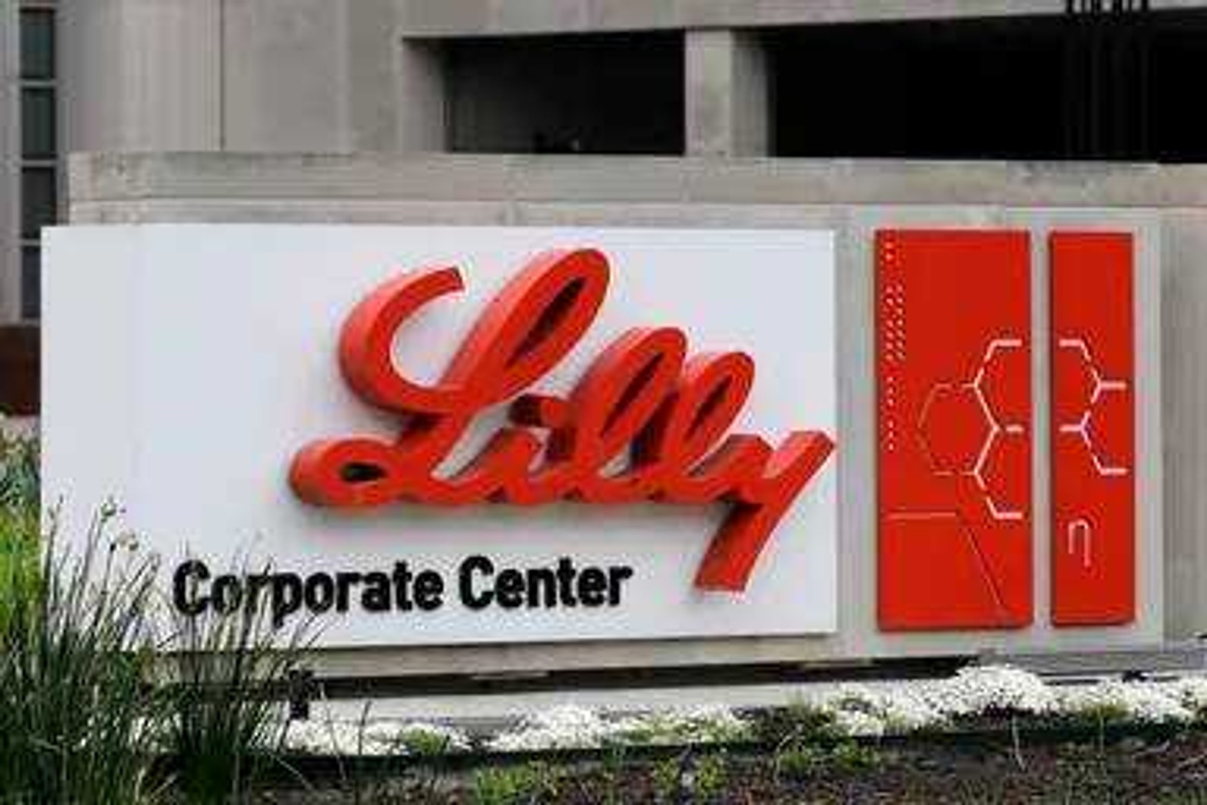 A sign for Eli Lilly & Co. sits outside their corporate headquarters in Indianapolis on April 26, 2017. A closely watched Alzheimer's drug from Eli Lilly won the backing of federal health advisers on Monday, June 10, 2024, setting the stage for the treatment's expected approval for people with mild dementia caused by the brain-robbing disease. 