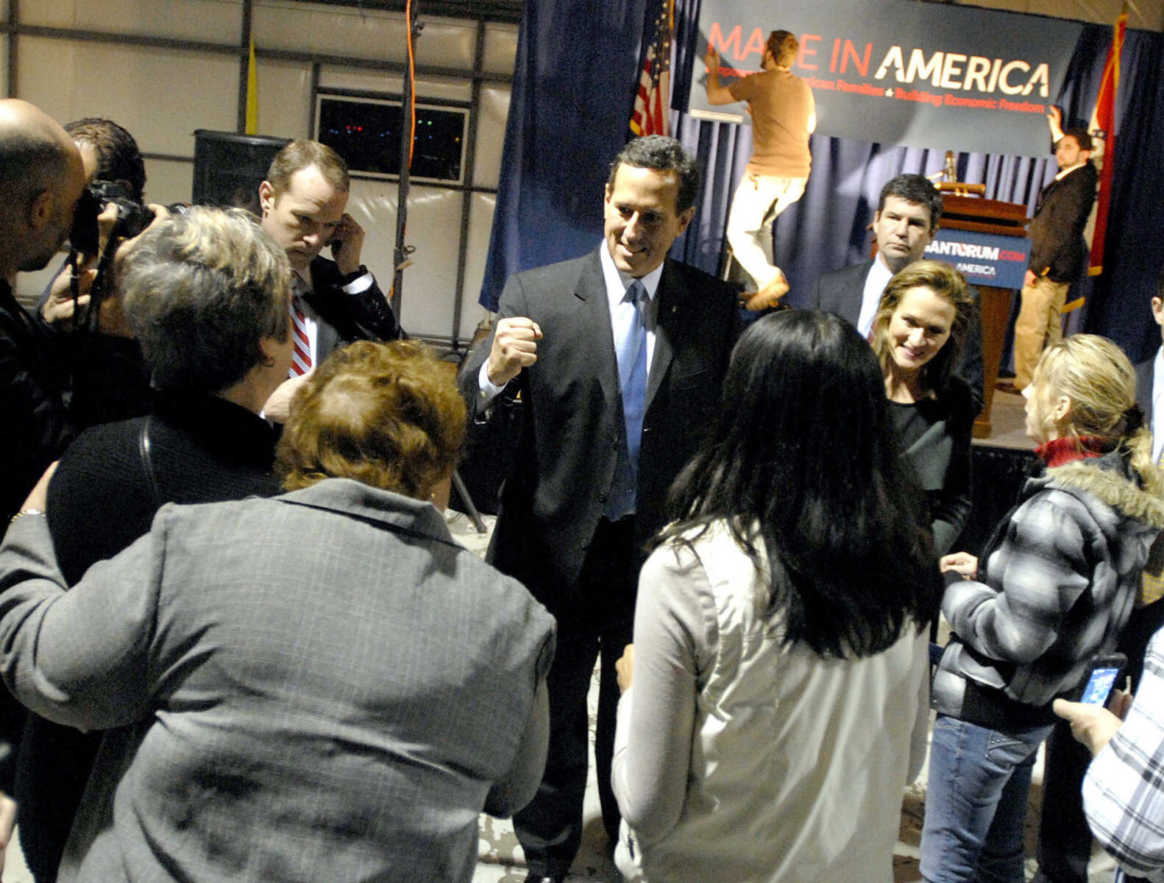 LAURA SIMON ~ lsimon@semissourian.com
Republican presidential candidate Rick Santorum visits with the crowd in the hanger at the Cape Girardeau Regional Airport Saturday night, March 10, 2012 during his campaign stop. Santorum was heading to Tupelo, Miss. following his stop in Cape Girardeau,Mo.