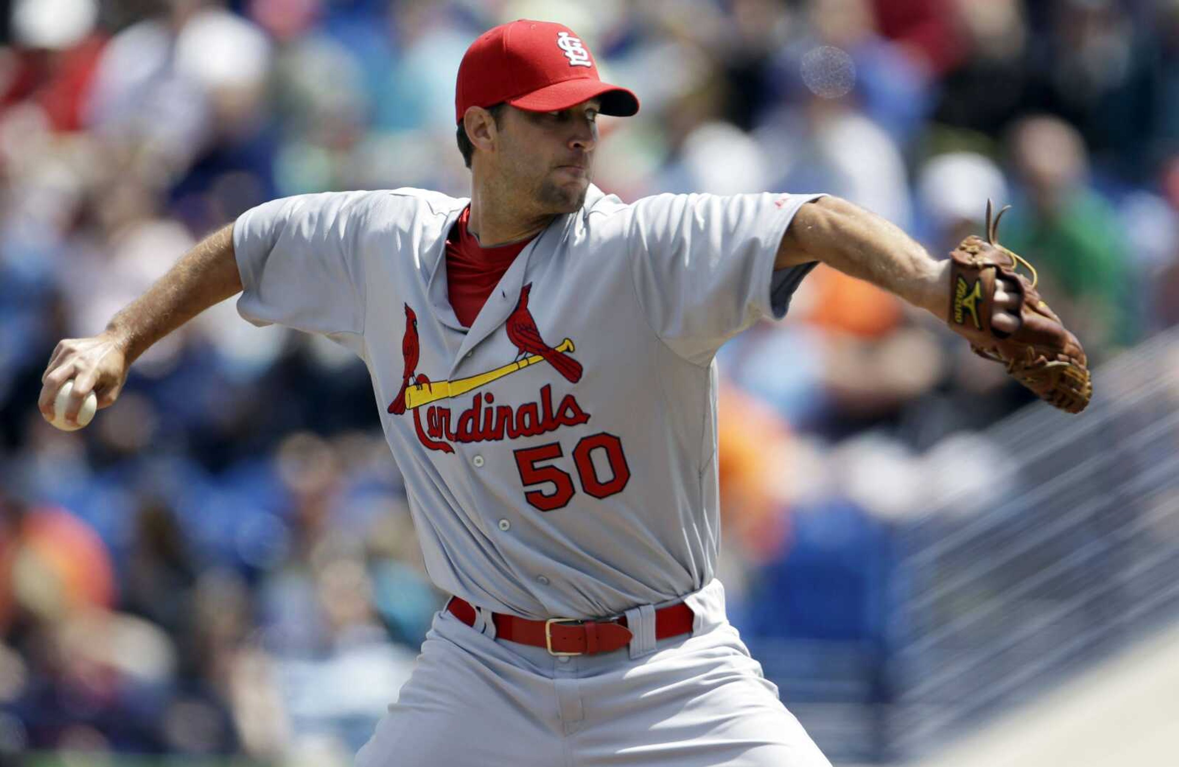 Adam Wainwright will take the mound tonight for St. Louis when the Cardinals open their 2013 season against the Diamondbacks in Arizona. (Jeff Roberson ~ Associated Press)