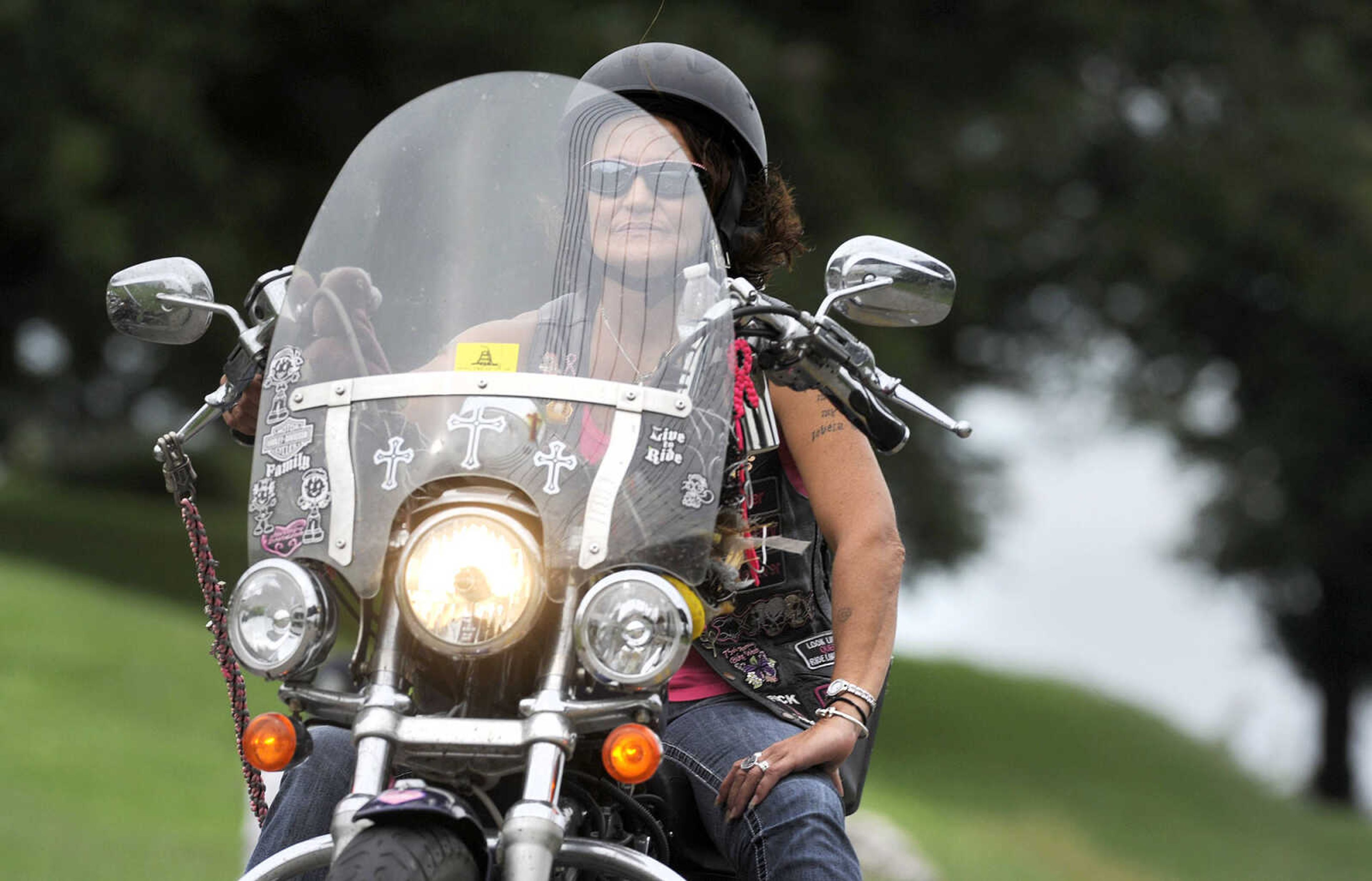 LAURA SIMON ~ lsimon@semissourian.com

Char "Tigger" Miller cruises down Aquamsi Street in Cape Girardeau on Thursday, Aug. 18, 2016.