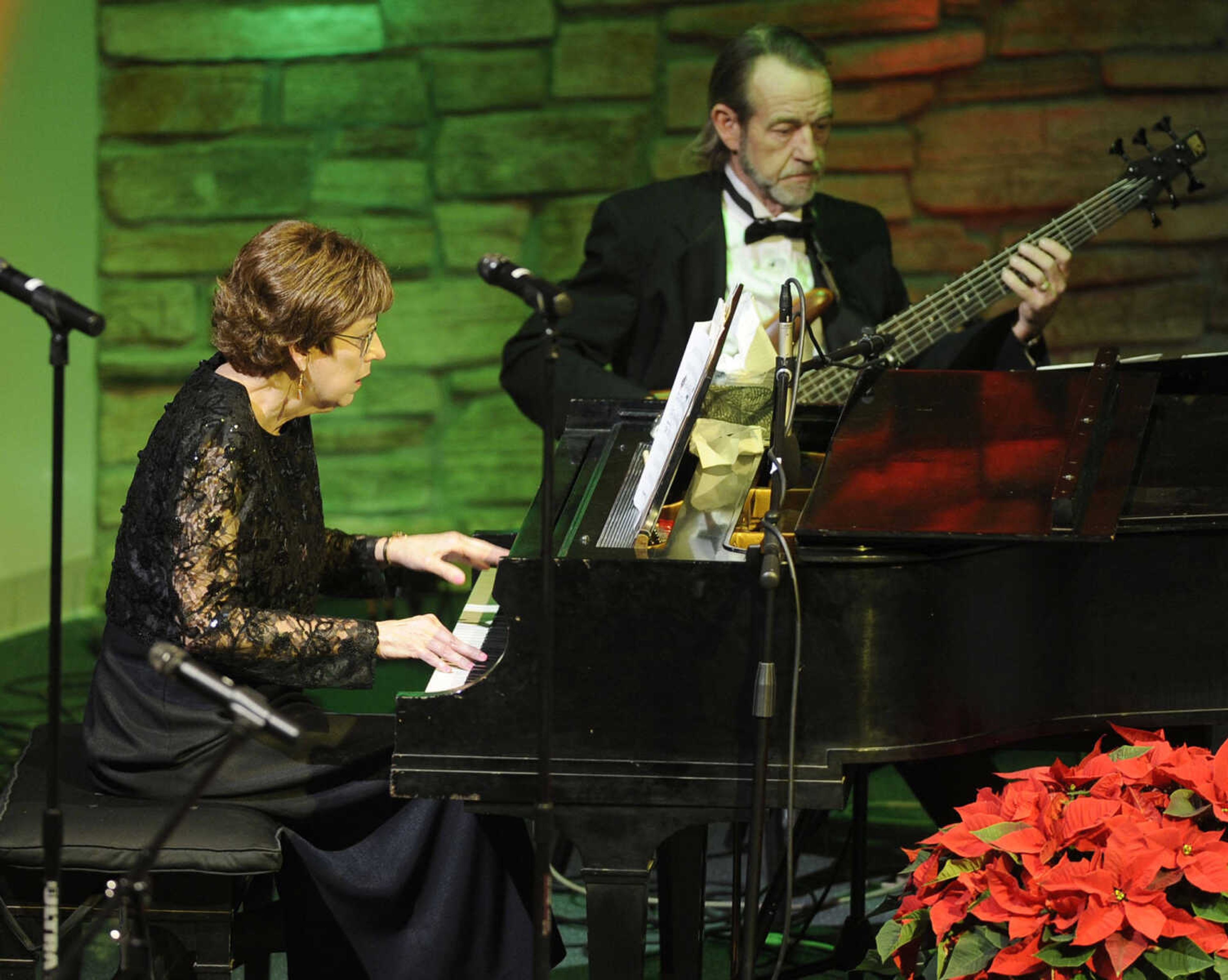 Beverly Reece is featured on piano with the Jerry Ford Orchestra in "The Christmas Waltz" at the Sounds of the Season Christmas concert Sunday, Dec. 7, 2014 at Cape Bible Chapel.